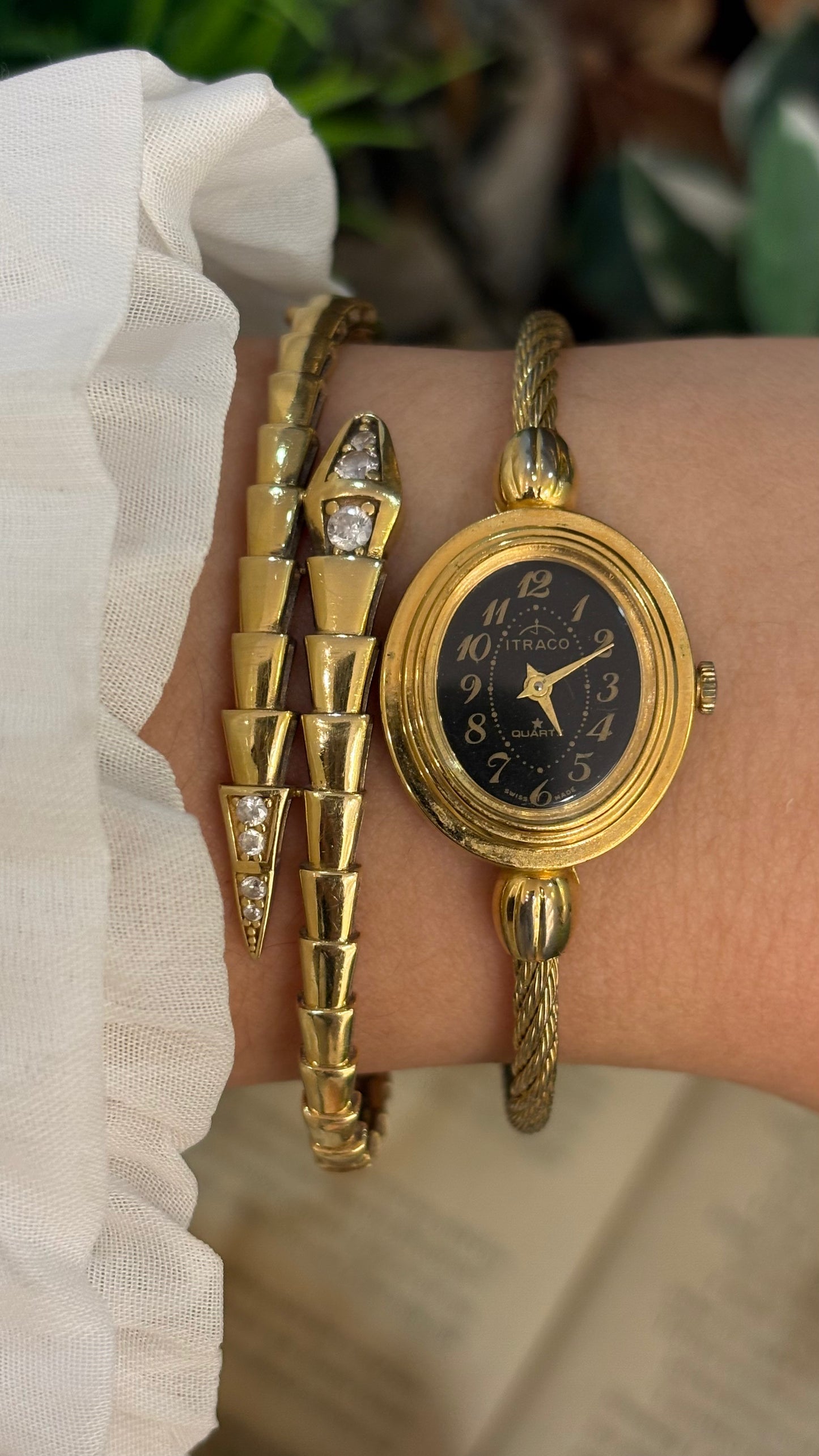 Rare Elegant Vintage Itraco Twisted Bangle Watch in Gold Tone Black Oval Dial Quartz