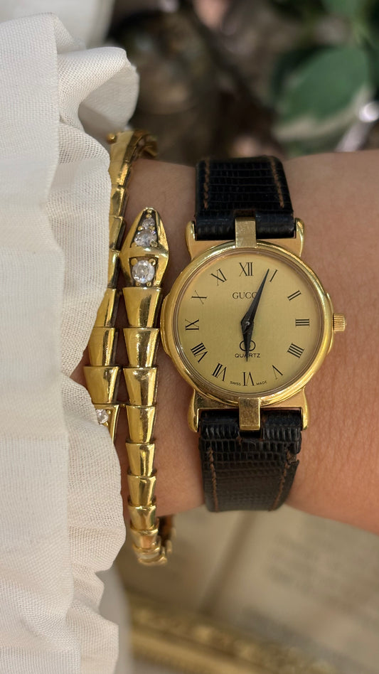 Vintage Gucci Swiss 3400F L Classic Roman Dial Watch in Gold Tone Black Leather Quartz