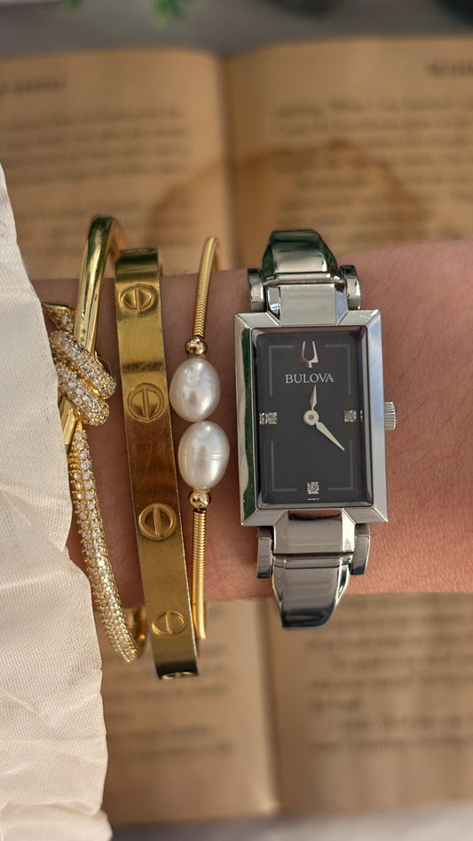 Rare Vintage Bulova Swiss Black Dial Bangle Watch in Silver Tone Quartz