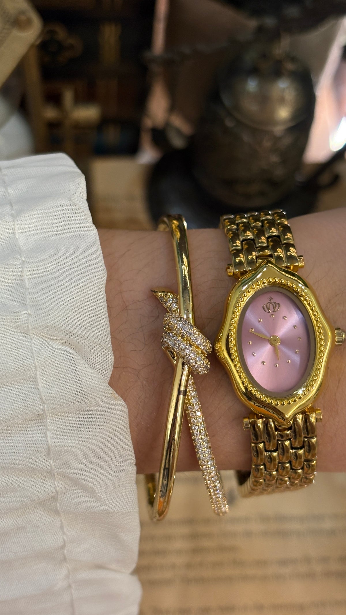 Rare Vintage Elegant Heel Intertwined V Bracelet Princess Watch in Gold Tone Pink Sunray Dial Quartz