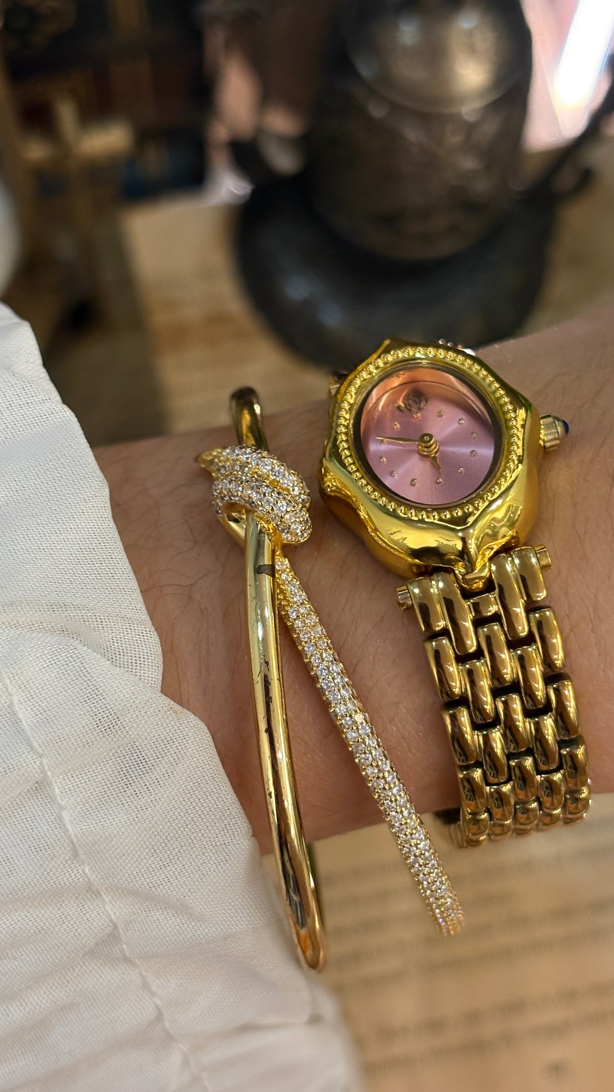 Rare Vintage Elegant Heel Intertwined V Bracelet Princess Watch in Gold Tone Pink Sunray Dial Quartz