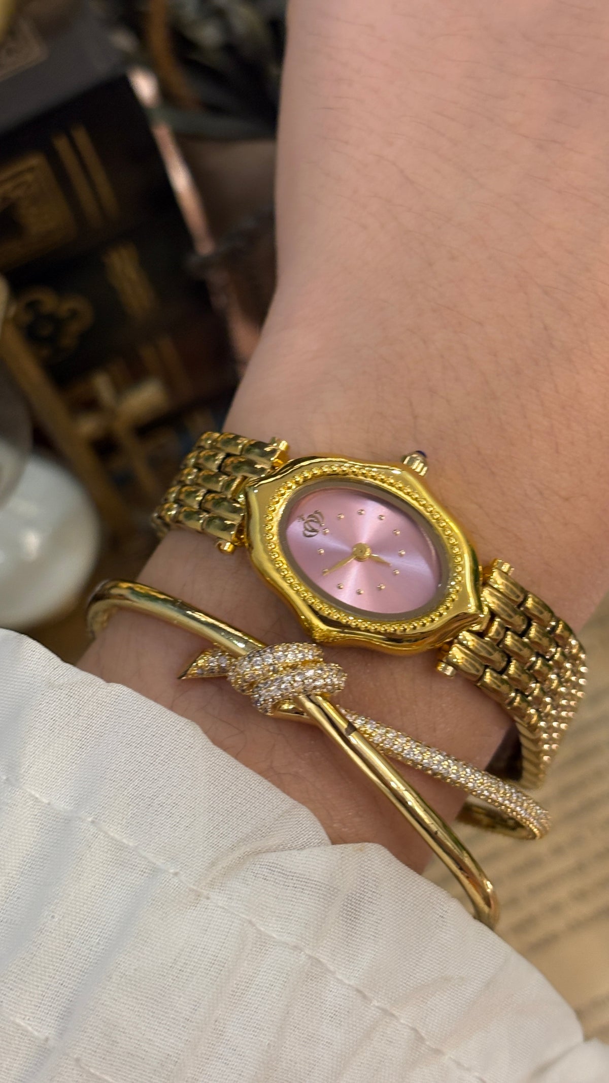 Rare Vintage Elegant Heel Intertwined V Bracelet Princess Watch in Gold Tone Pink Sunray Dial Quartz