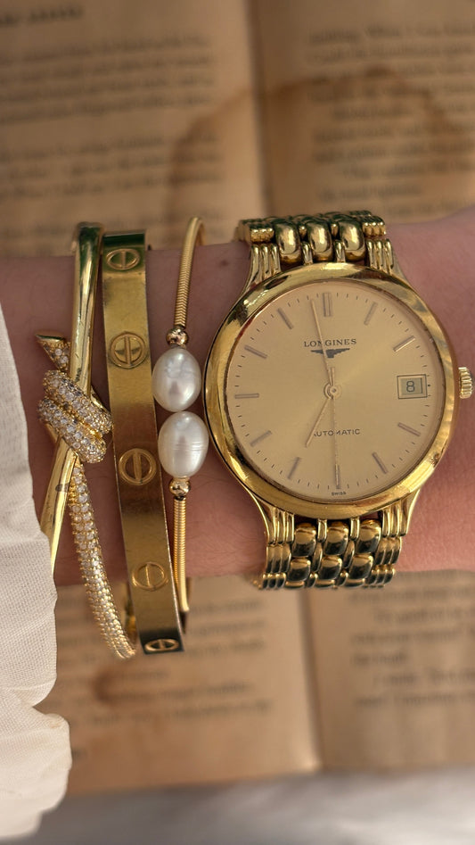 Extremely Rare Vintage Longines Swiss Automatic Mens Date Window Watch in Gold Tone Quartz