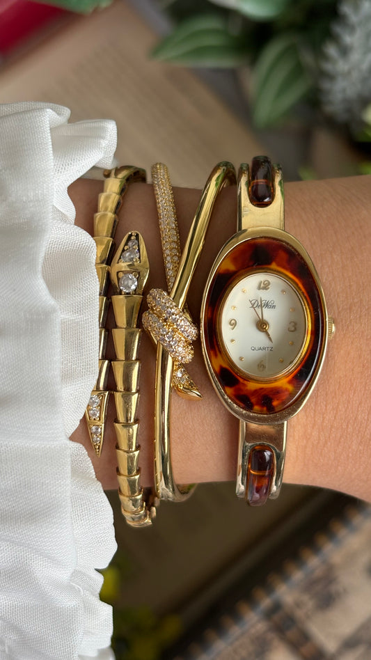 Vintage De Wan Tortoise Bangle Watch in Gold Tone Oval Face