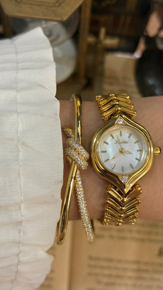 Rare Vintage Scottie Eye-shaped Dial with Rhinestone Accent Watch in Gold Tone Chevron Link Bracelet Mother of Pearl Dial Quartz