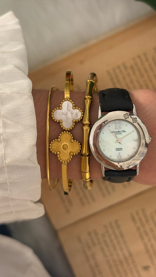 Rare Vintage Alessandra Olla Mother of Pearl Dial Flower Accent Watch in Silver Tone Black Leather Quartz