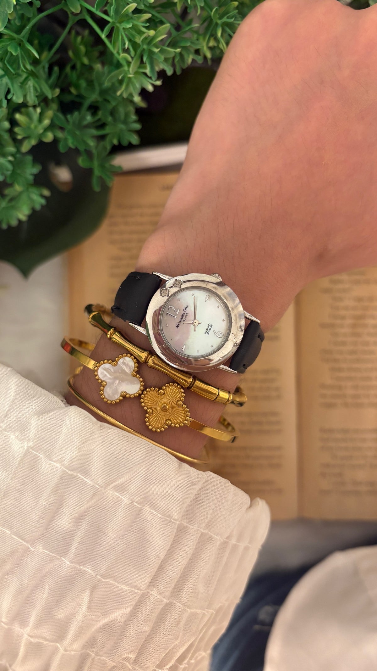 Rare Vintage Alessandra Olla Mother of Pearl Dial Flower Accent Watch in Silver Tone Black Leather Quartz