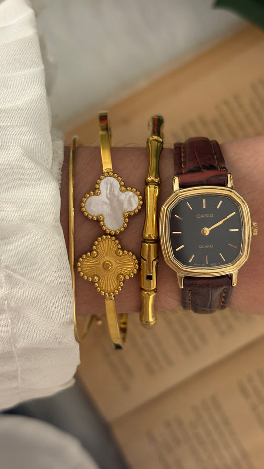 Rare vintage Casio Black Dial Mini Tank Watch in Gold Tone Brown Leather Quartz