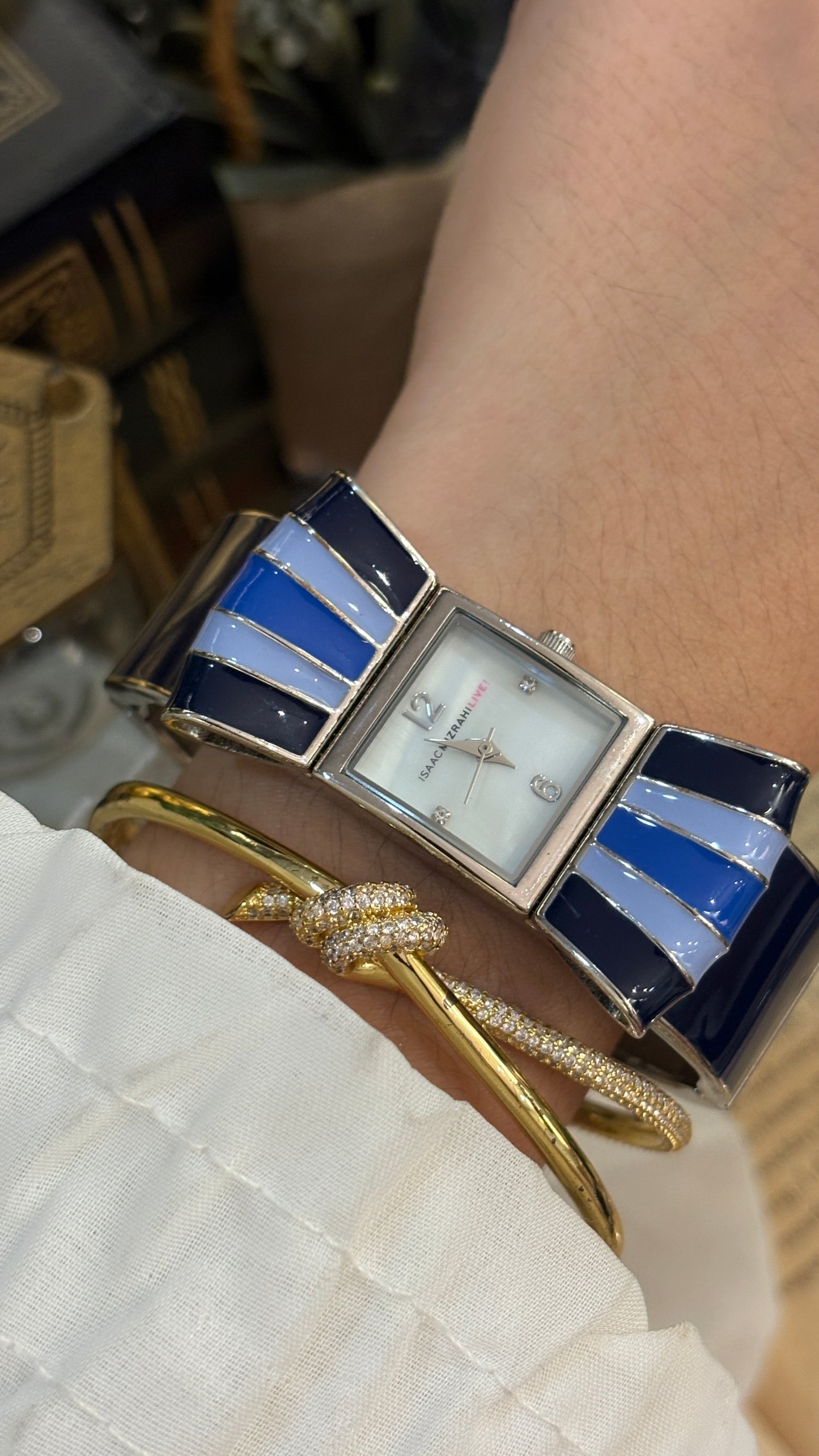 Rare Vintage Isaac Mizrahi Ribbon Motif Bangle Watch in Silver Tone Mother of Pearl Dial Quartz
