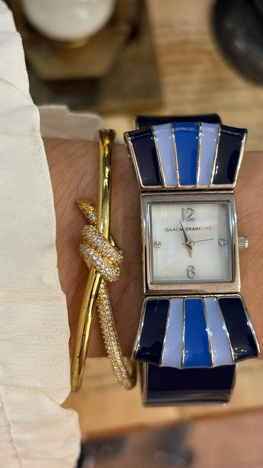 Rare Vintage Isaac Mizrahi Ribbon Motif Bangle Watch in Silver Tone Mother of Pearl Dial Quartz