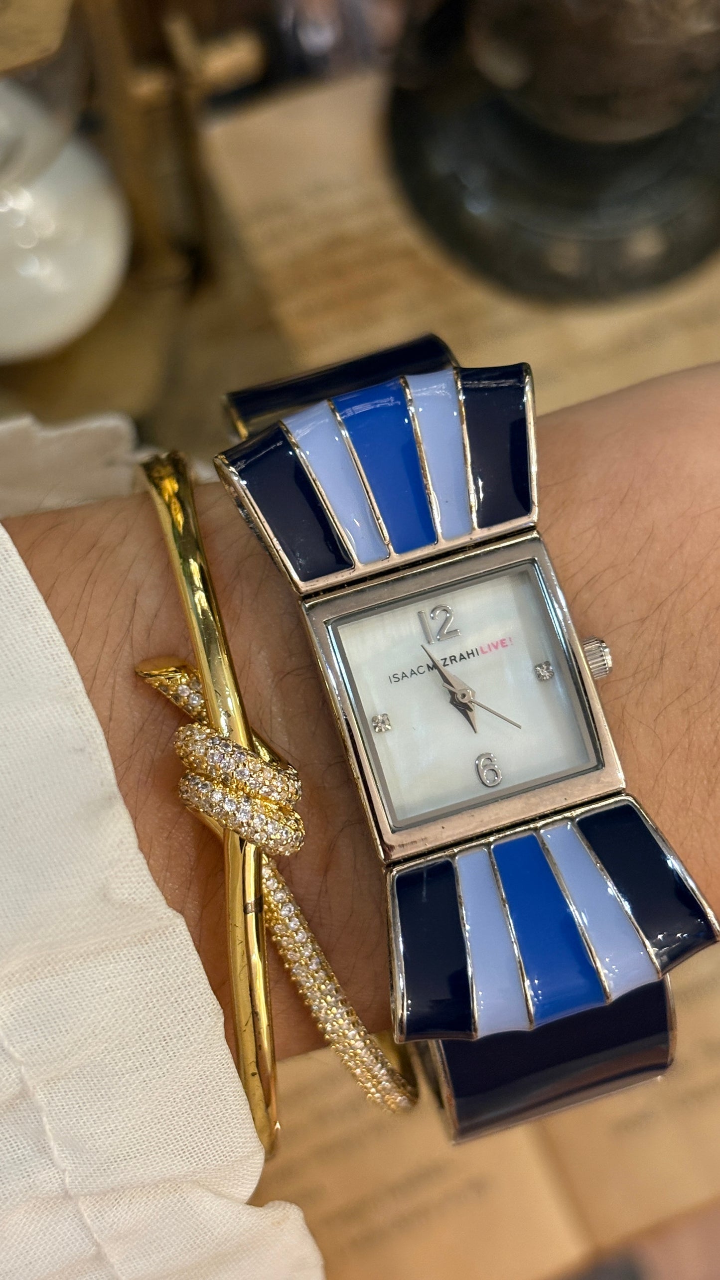 Rare Vintage Isaac Mizrahi Ribbon Motif Bangle Watch in Silver Tone Mother of Pearl Dial Quartz