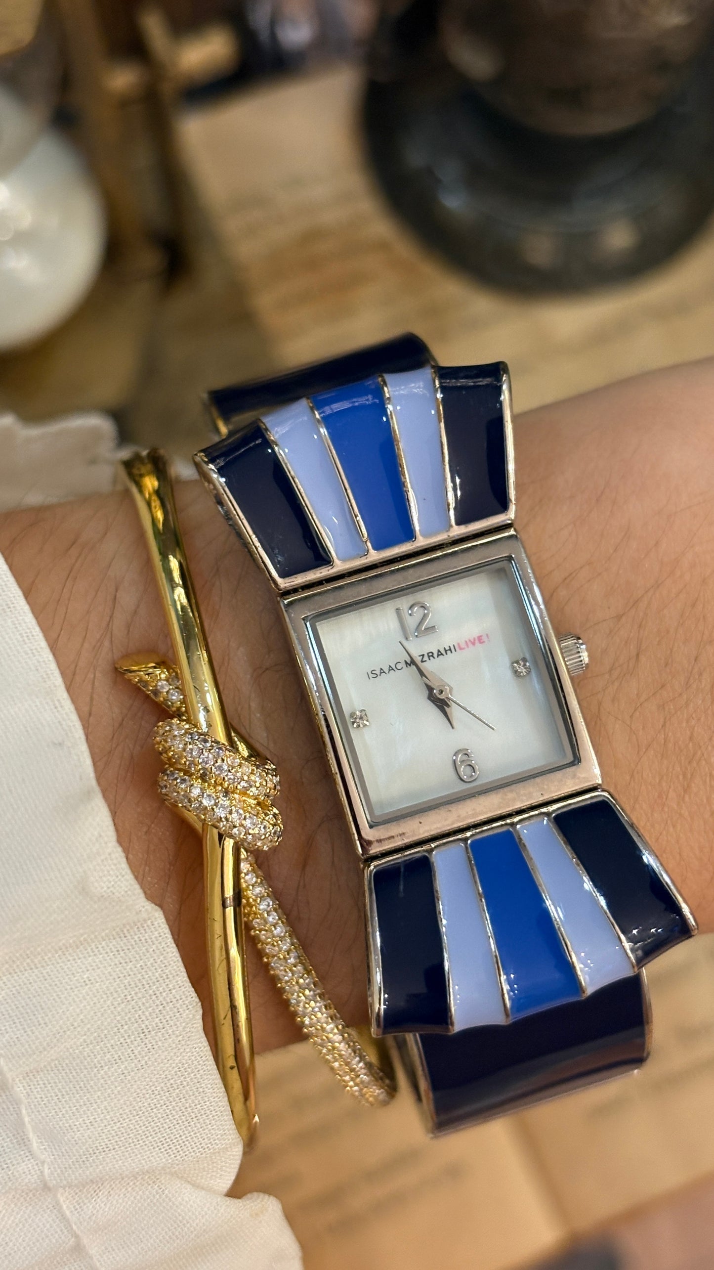 Rare Vintage Isaac Mizrahi Ribbon Motif Bangle Watch in Silver Tone Mother of Pearl Dial Quartz