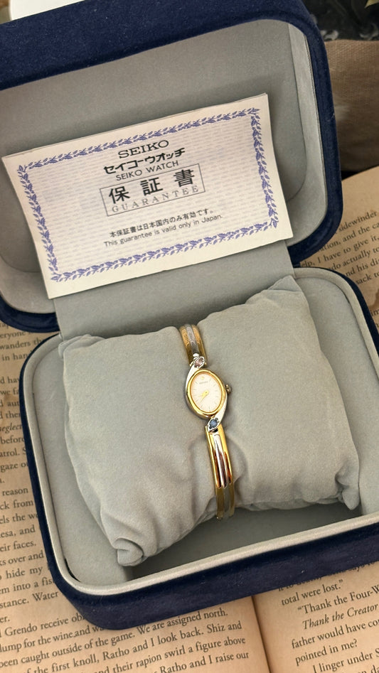 Extremely Rare Boxed Dainty Vintage Seiko Rose Quartz and Aquamarine Accent Bangle Watch in Two-Tone Quartz