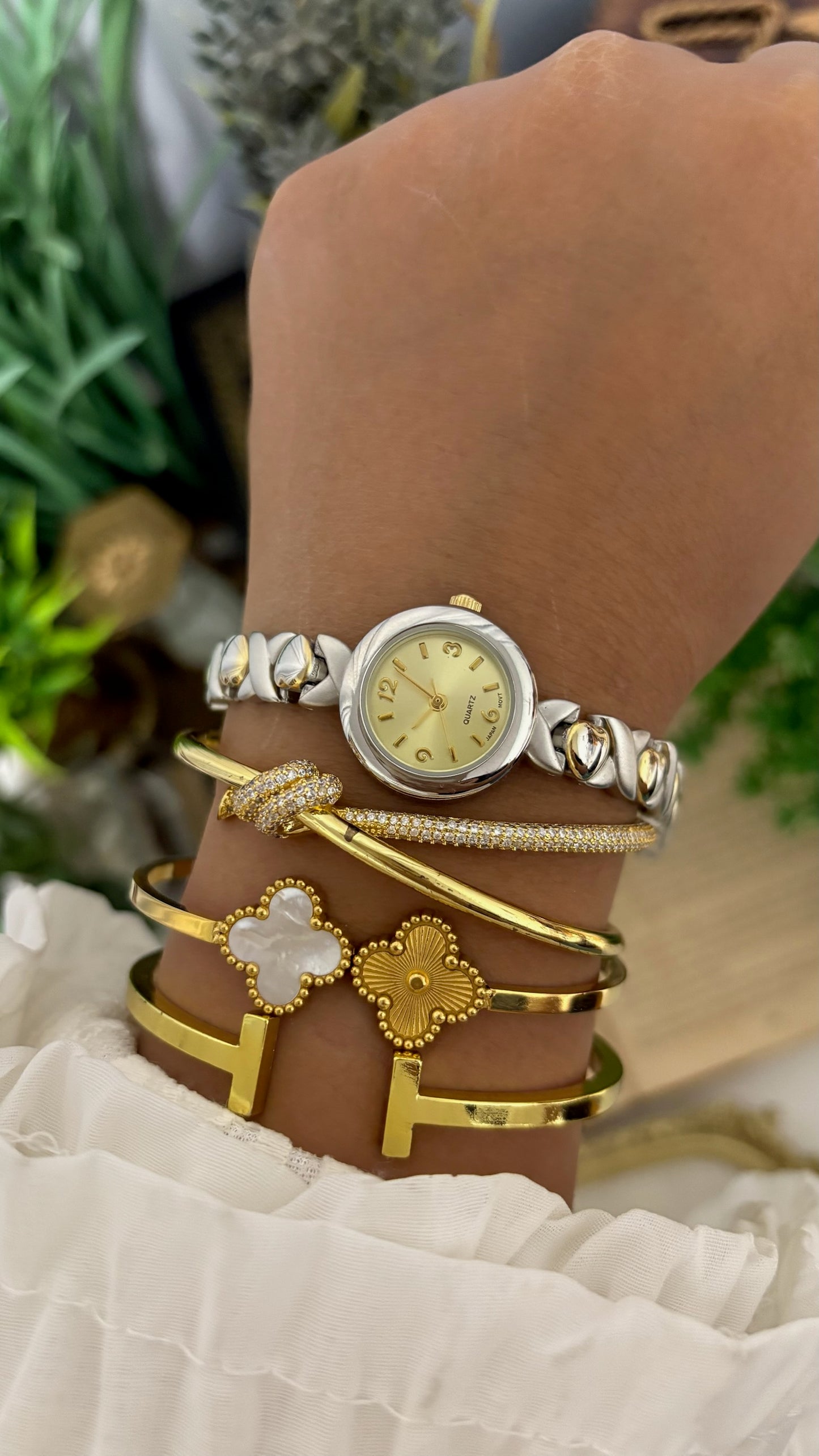Vintage Geneva X-Link Hugs & Kisses Bracelet Watch in Two-Tone Silver and Gold Champagne Dial Quartz