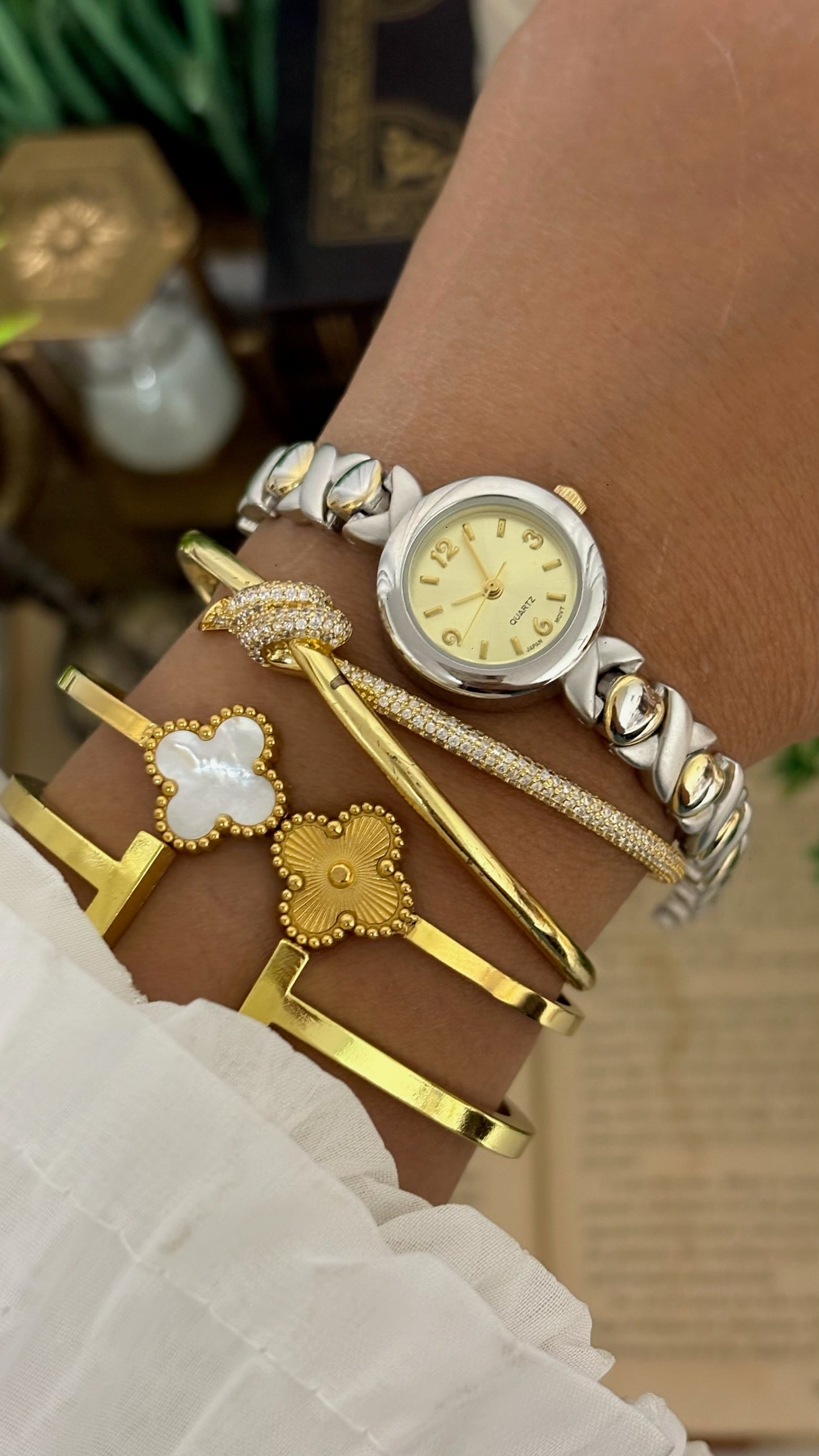 Vintage Geneva X-Link Hugs & Kisses Bracelet Watch in Two-Tone Silver and Gold Champagne Dial Quartz