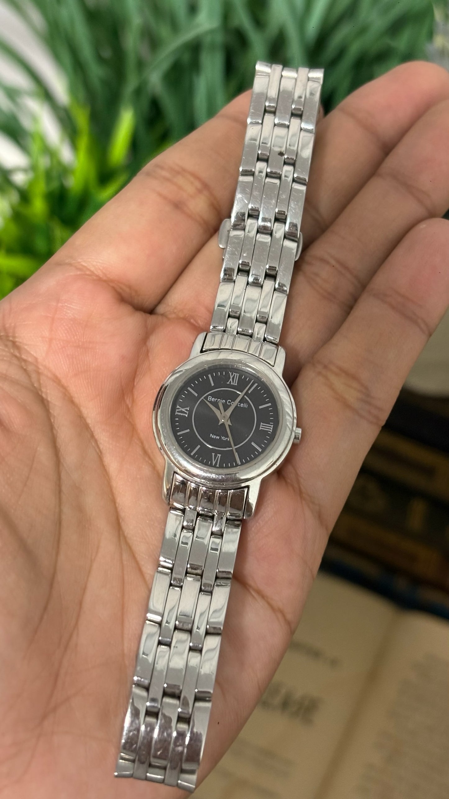 Vintage Bernie Cortelli New York Round Face Watch with Roman Numerals in Silver Tone Black Dial Quartz