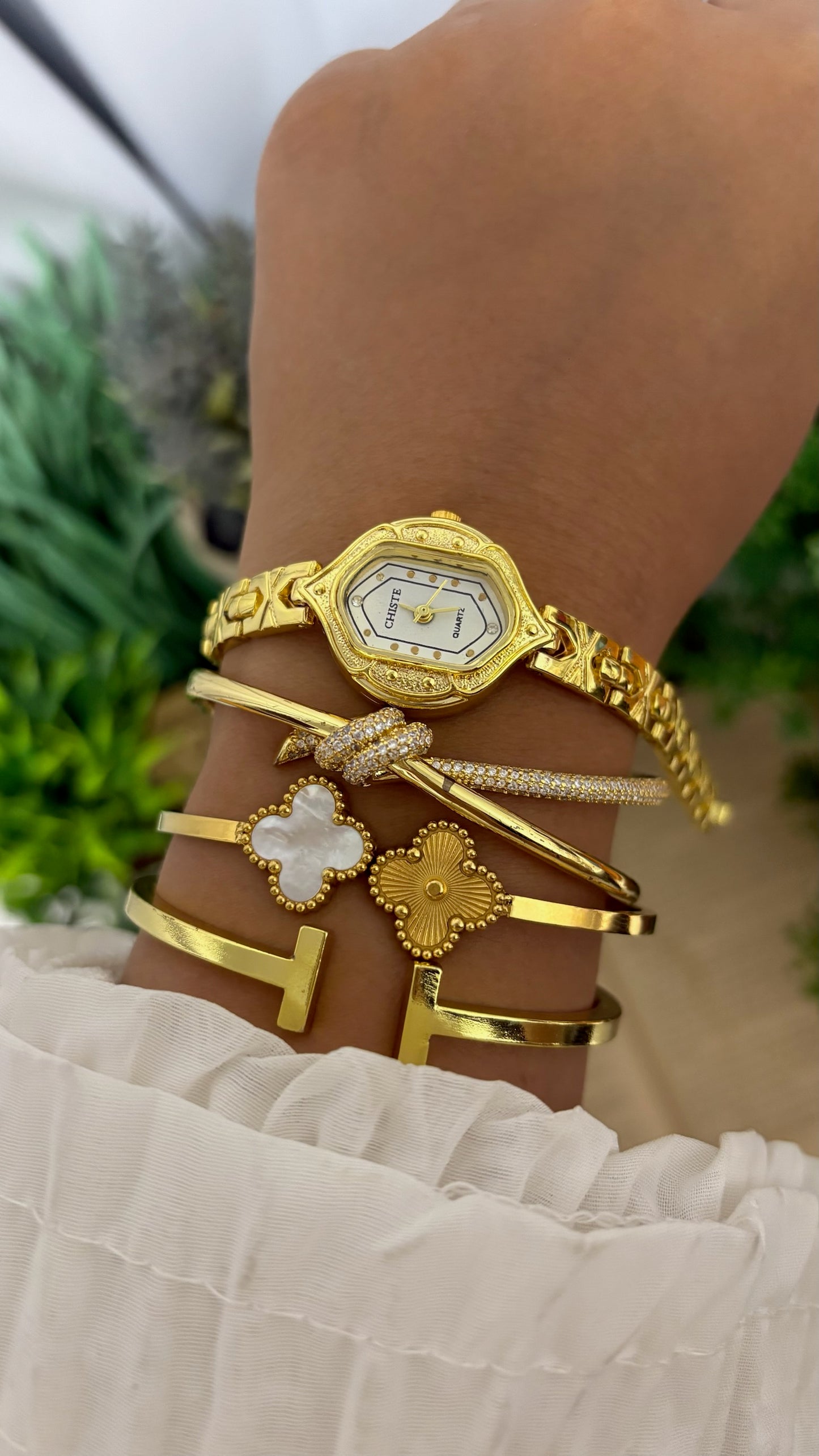 Vintage Chiste Elongated Hexagonal Filigree Case Bracelet Watch in Gold Tone White Dial Quartz