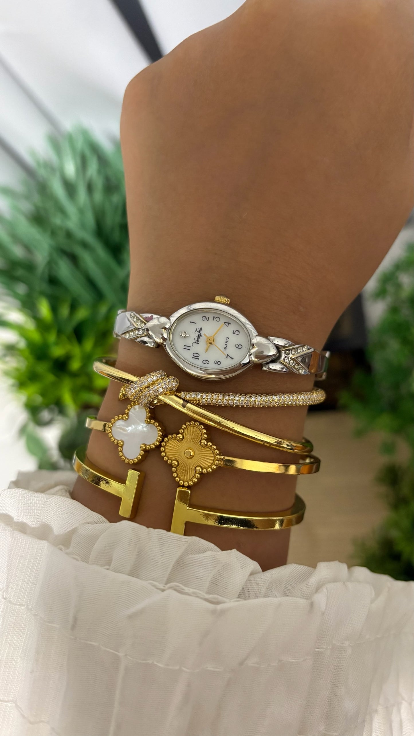 Vintage Vanity Fair Oval Face Crystal Accent Watch with Heart Lugs and Expansion Band in Silver Tone White Dial Quartz