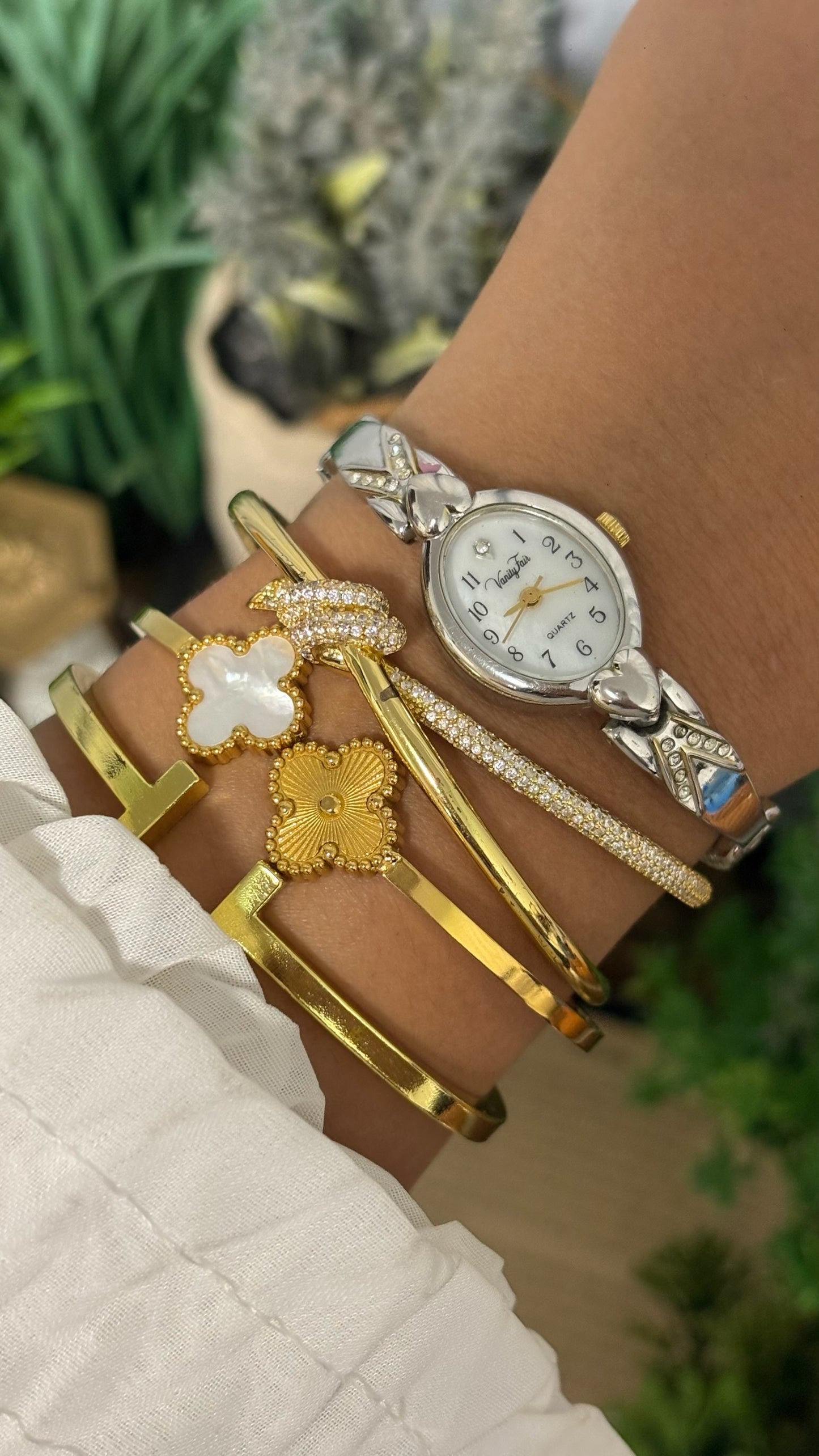 Vintage Vanity Fair Oval Face Crystal Accent Watch with Heart Lugs and Expansion Band in Silver Tone White Dial Quartz