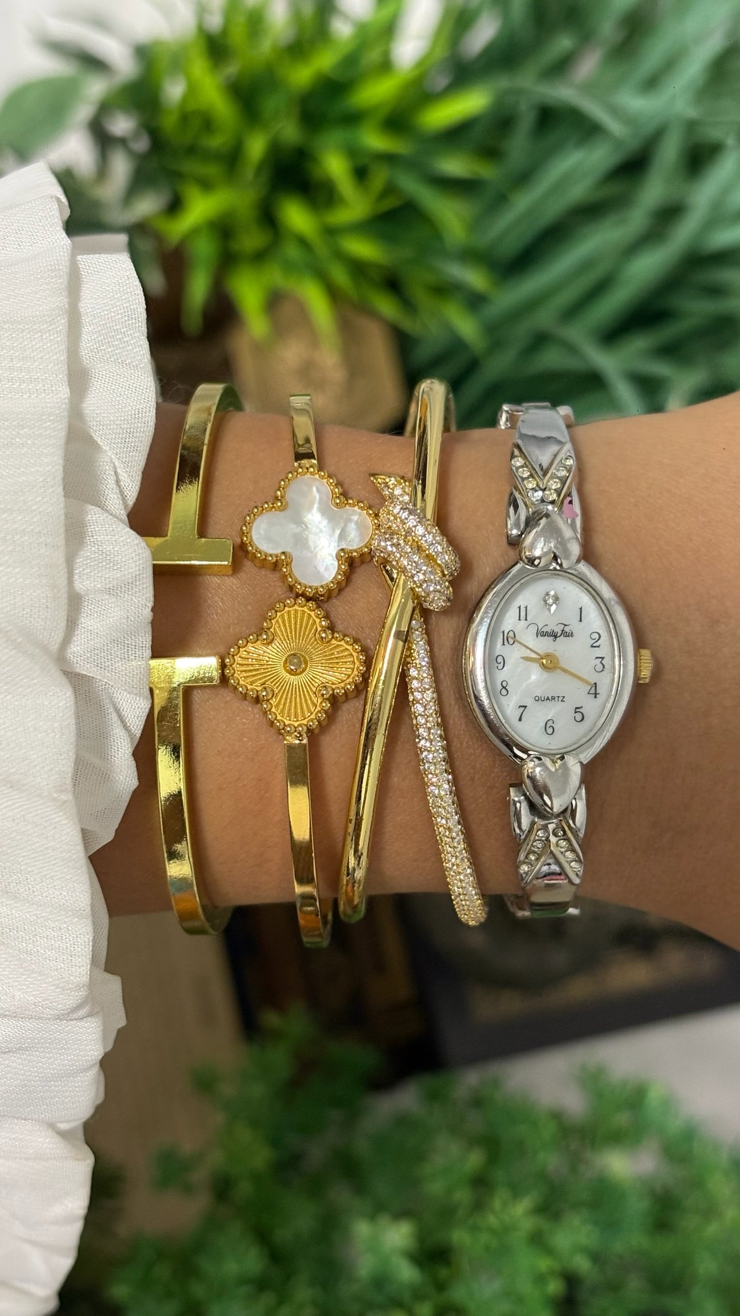 Vintage Vanity Fair Oval Face Crystal Accent Watch with Heart Lugs and Expansion Band in Silver Tone White Dial Quartz