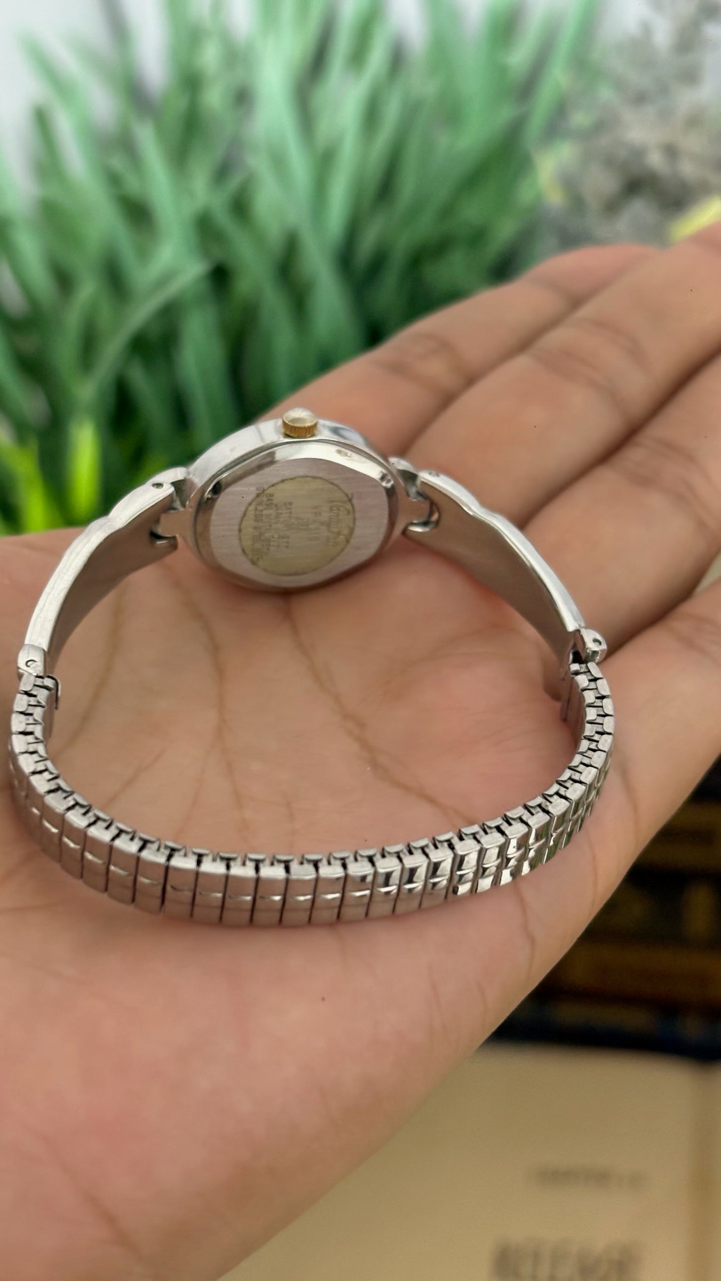 Vintage Vanity Fair Oval Face Crystal Accent Watch with Heart Lugs and Expansion Band in Silver Tone White Dial Quartz