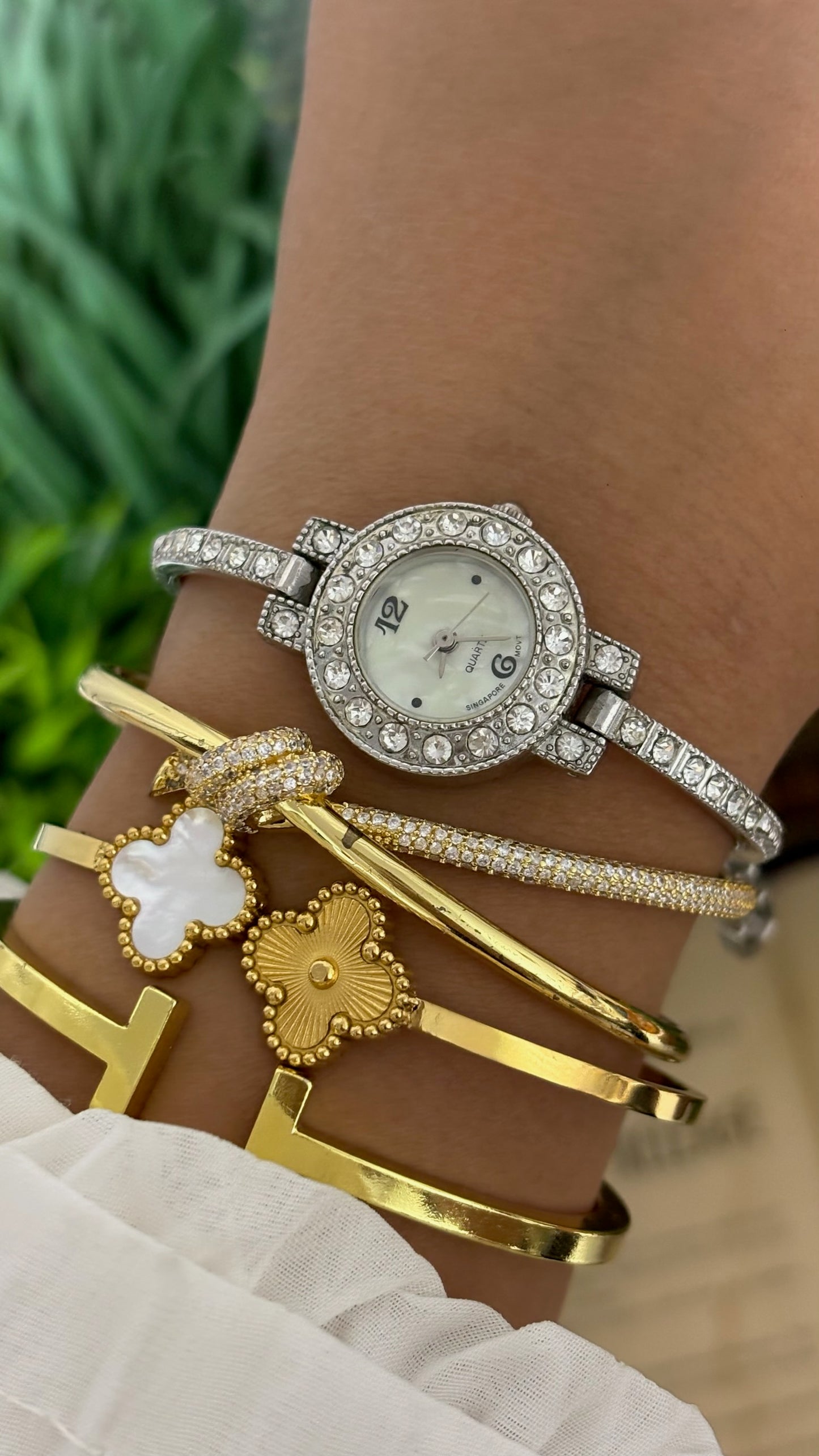 Vintage Round Crystal Halo Bezel Bangle Watch with Rhinestone Accents in Silver Tone White Mother of Pearl Dial Quartz