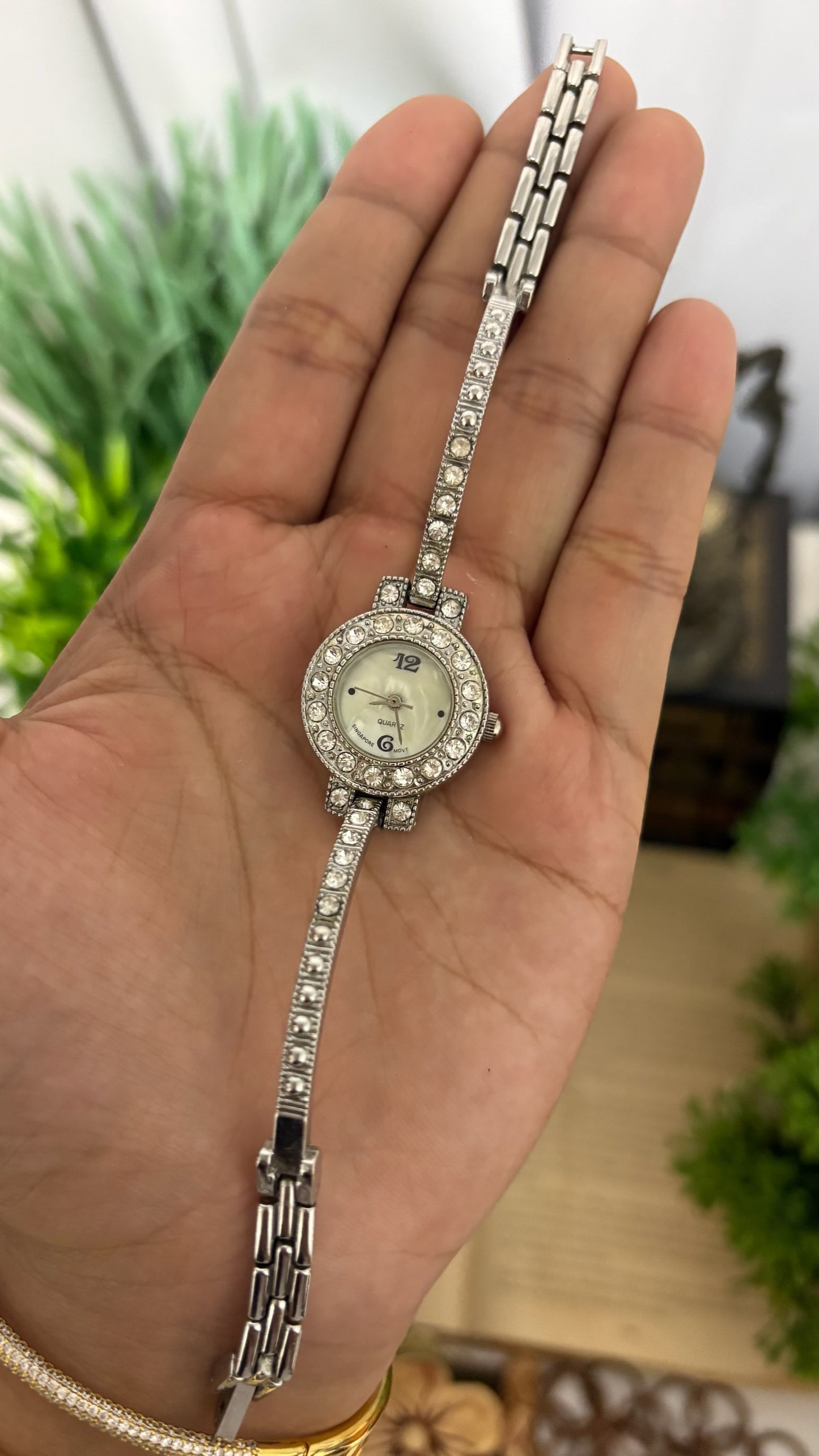 Vintage Round Crystal Halo Bezel Bangle Watch with Rhinestone Accents in Silver Tone White Mother of Pearl Dial Quartz