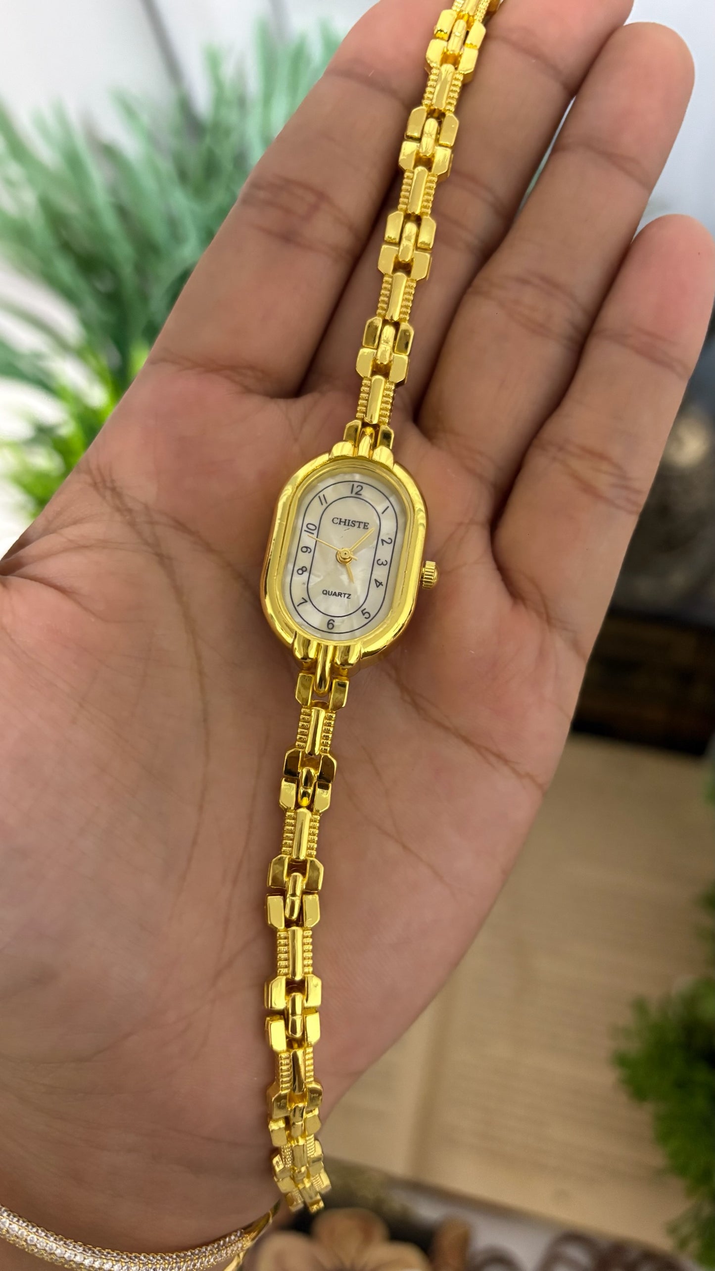 Vintage Chiste Oval Case Watch with Segmented Jewelry Link Bracelet in Gold Tone White Track Dial Quartz