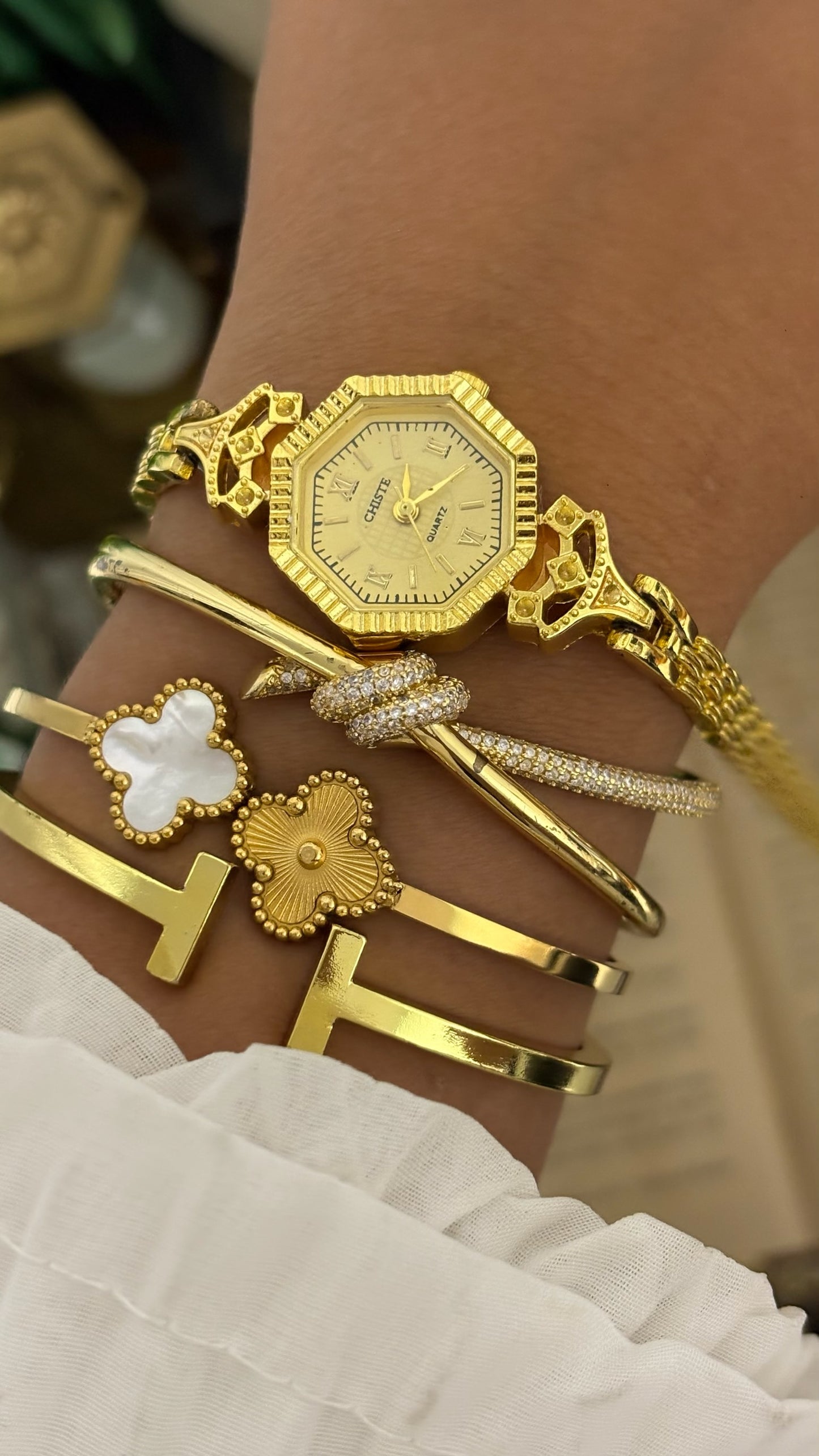 Vintage Chiste Octagonal Coin Edge Watch with Detailed Crown Filigree Lugs and Smooth Link Bracelet in Gold Tone Gold Textured Dial Quartz