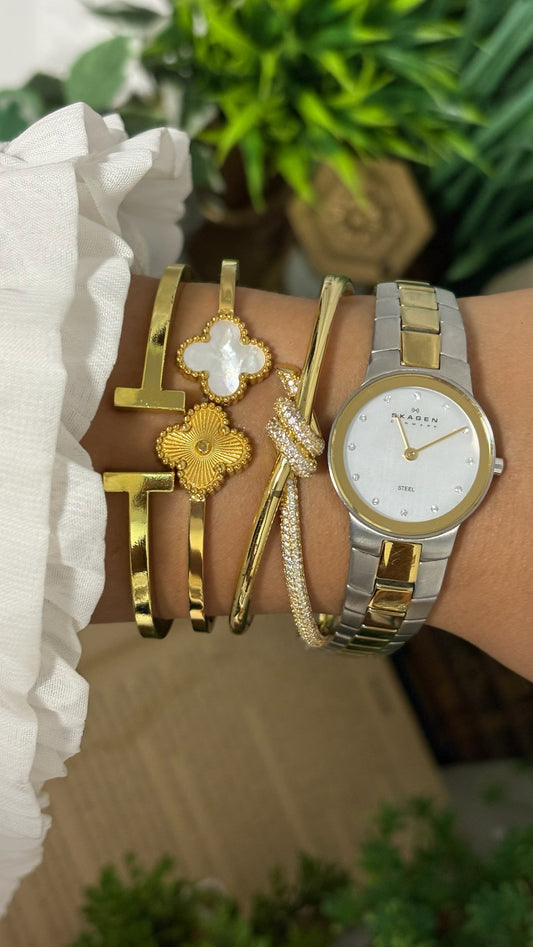 Vintage Skagen Denmark Slim Round Dress Watch with Crystal Hour Markers and Two-Tone White Sunray Dial Quartz