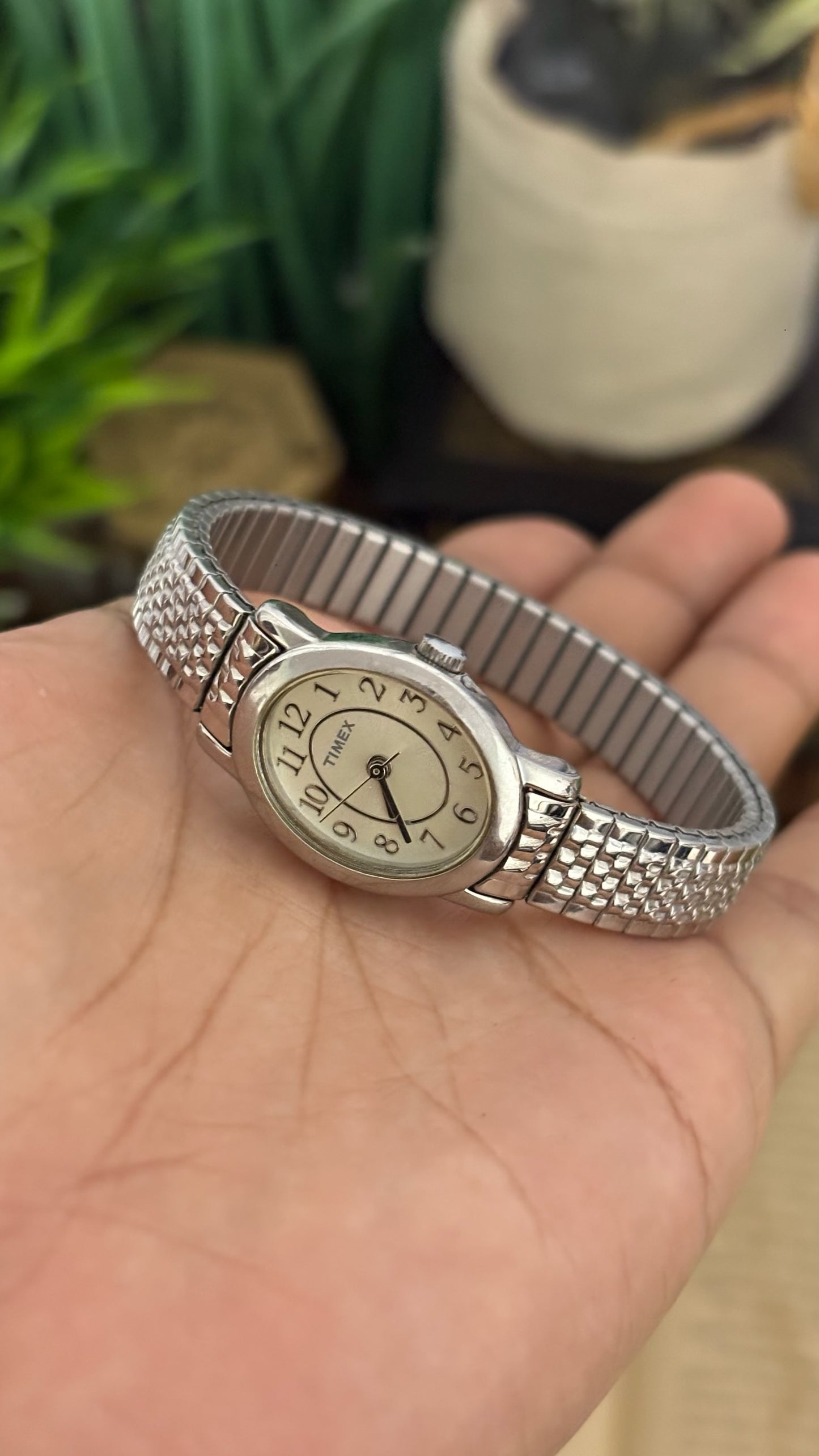 Vintage Timex Petite Oval Dress Watch with Textured Rice-Style Expansion Band in Silver Tone White Dial Quartz