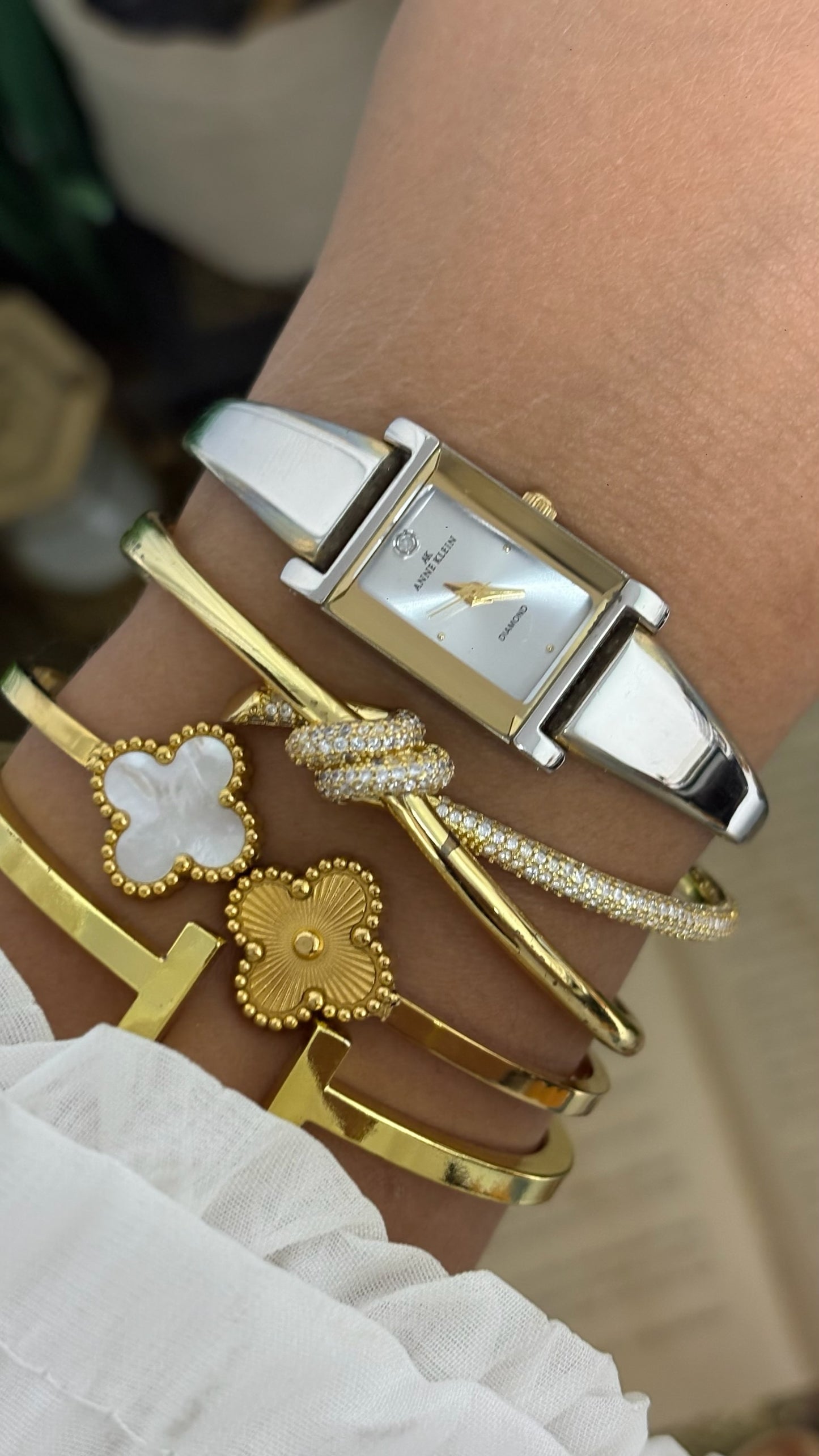 Vintage Anne Klein Petite Rectangular Tank Watch with Diamond Accent and Polished Bangle-Style Bracelet in Two-Tone Silver and Gold White Dial Quartz