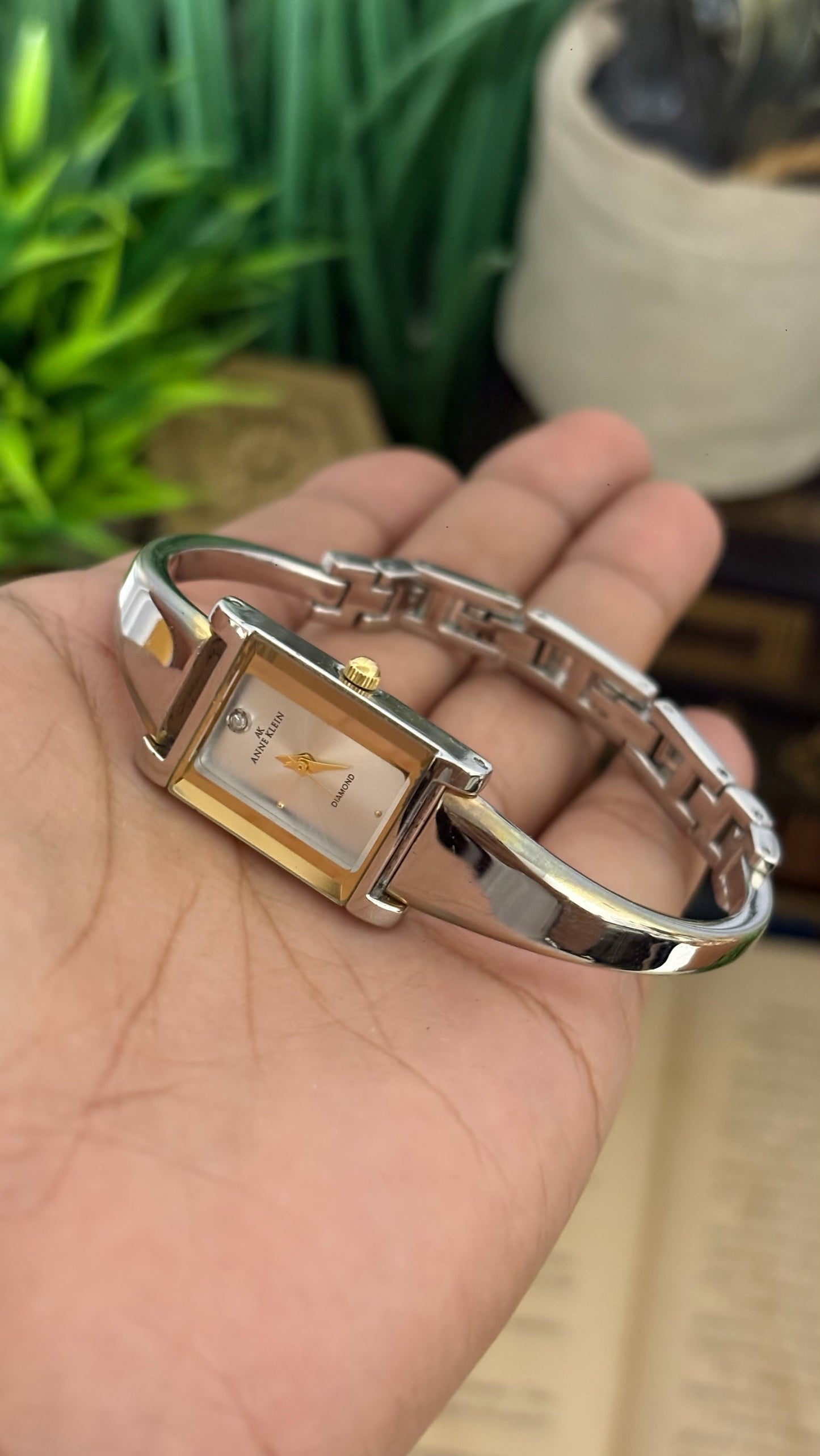 Vintage Anne Klein Petite Rectangular Tank Watch with Diamond Accent and Polished Bangle-Style Bracelet in Two-Tone Silver and Gold White Dial Quartz