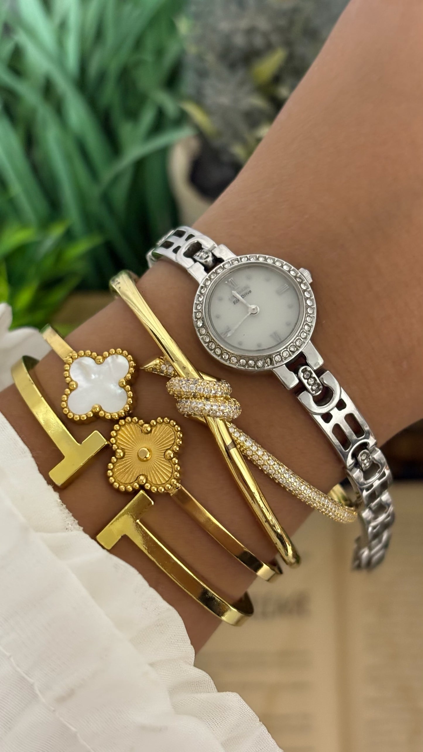Vintage Citizen Eco-Drive Petite Round Dress Watch with Rhinestone Bezel, Mixed Roman Numeral Dials, and Openwork Geometric Link Bracelet with Crystal Accents in Silver Tone White Dial