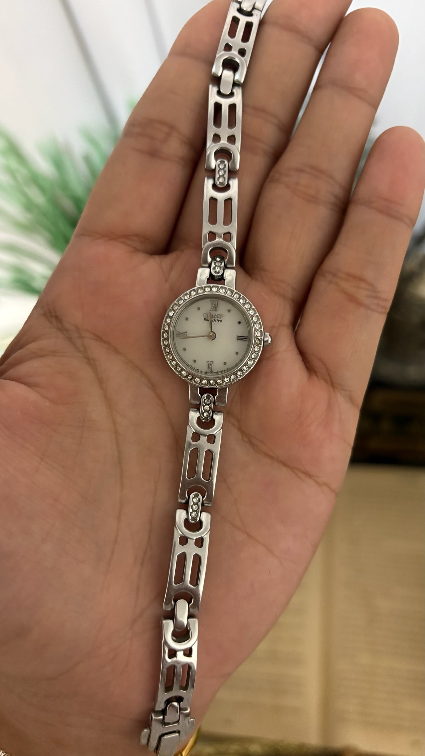 Vintage Citizen Eco-Drive Petite Round Dress Watch with Rhinestone Bezel, Mixed Roman Numeral Dials, and Openwork Geometric Link Bracelet with Crystal Accents in Silver Tone White Dial