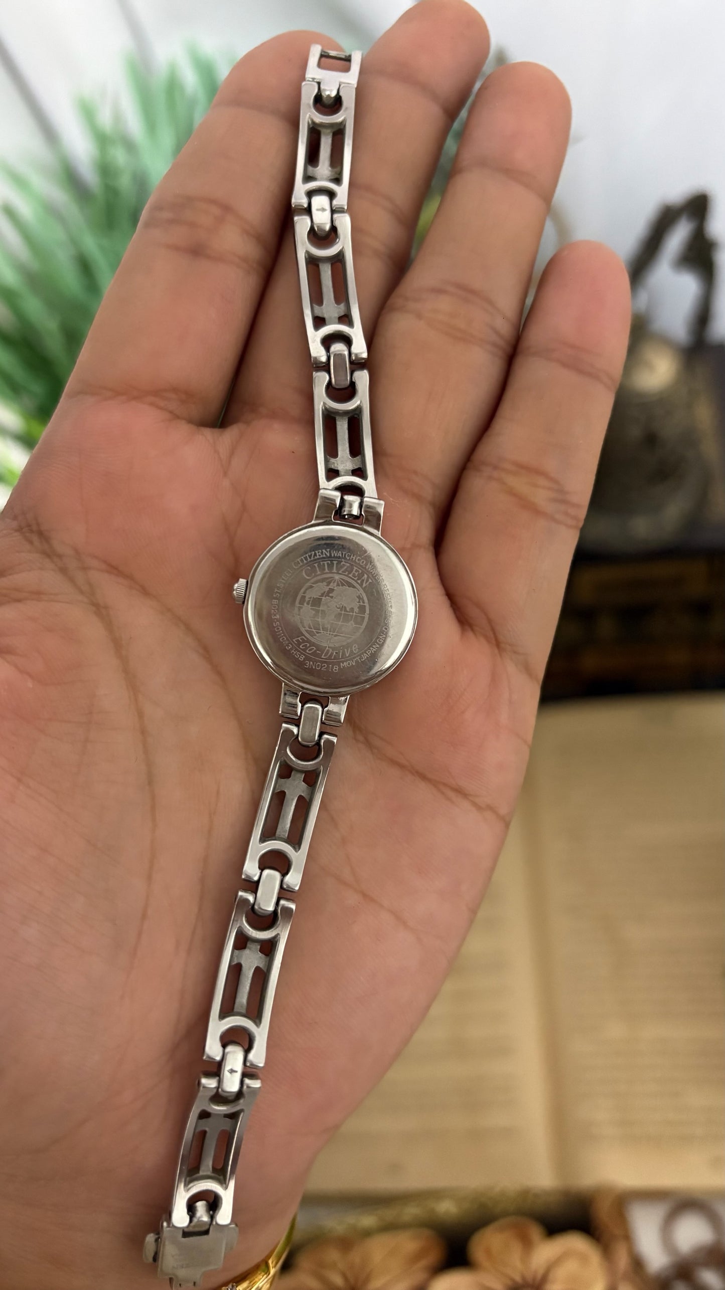 Vintage Citizen Eco-Drive Petite Round Dress Watch with Rhinestone Bezel, Mixed Roman Numeral Dials, and Openwork Geometric Link Bracelet with Crystal Accents in Silver Tone White Dial