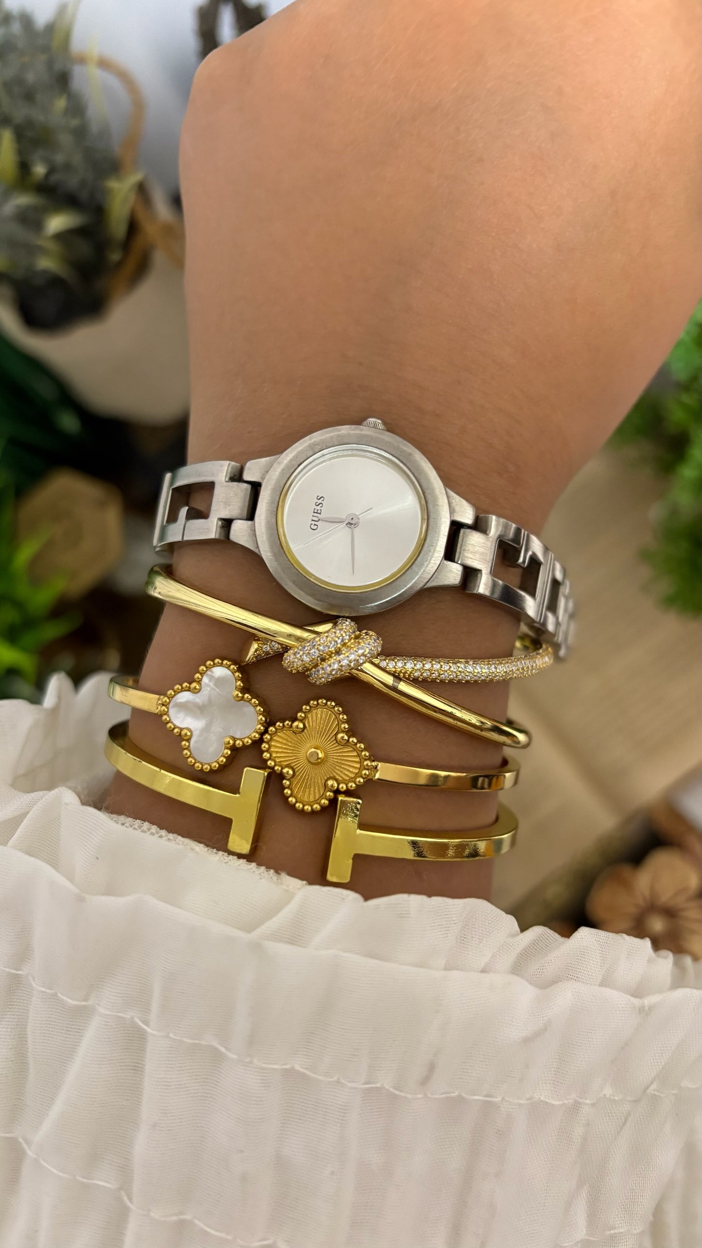 Vintage Guess Round Dress Watch with Thick Crystal-Set Bezel, Crystal Hour Markers, and White Ceramic Panel Link Bracelet in Gold Tone White Dial Quartz