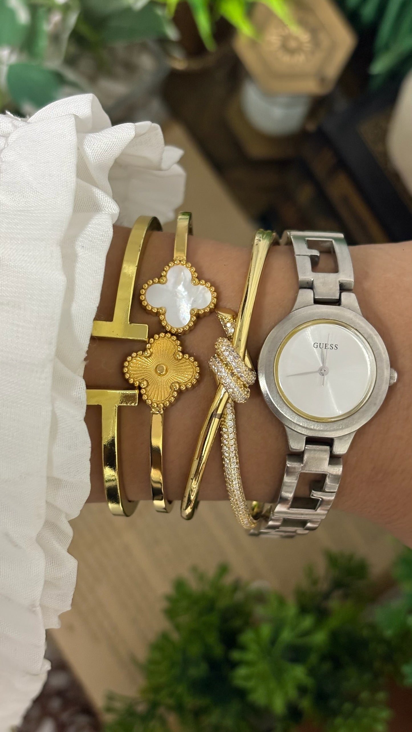 Vintage Guess Round Dress Watch with Thick Crystal-Set Bezel, Crystal Hour Markers, and White Ceramic Panel Link Bracelet in Gold Tone White Dial Quartz