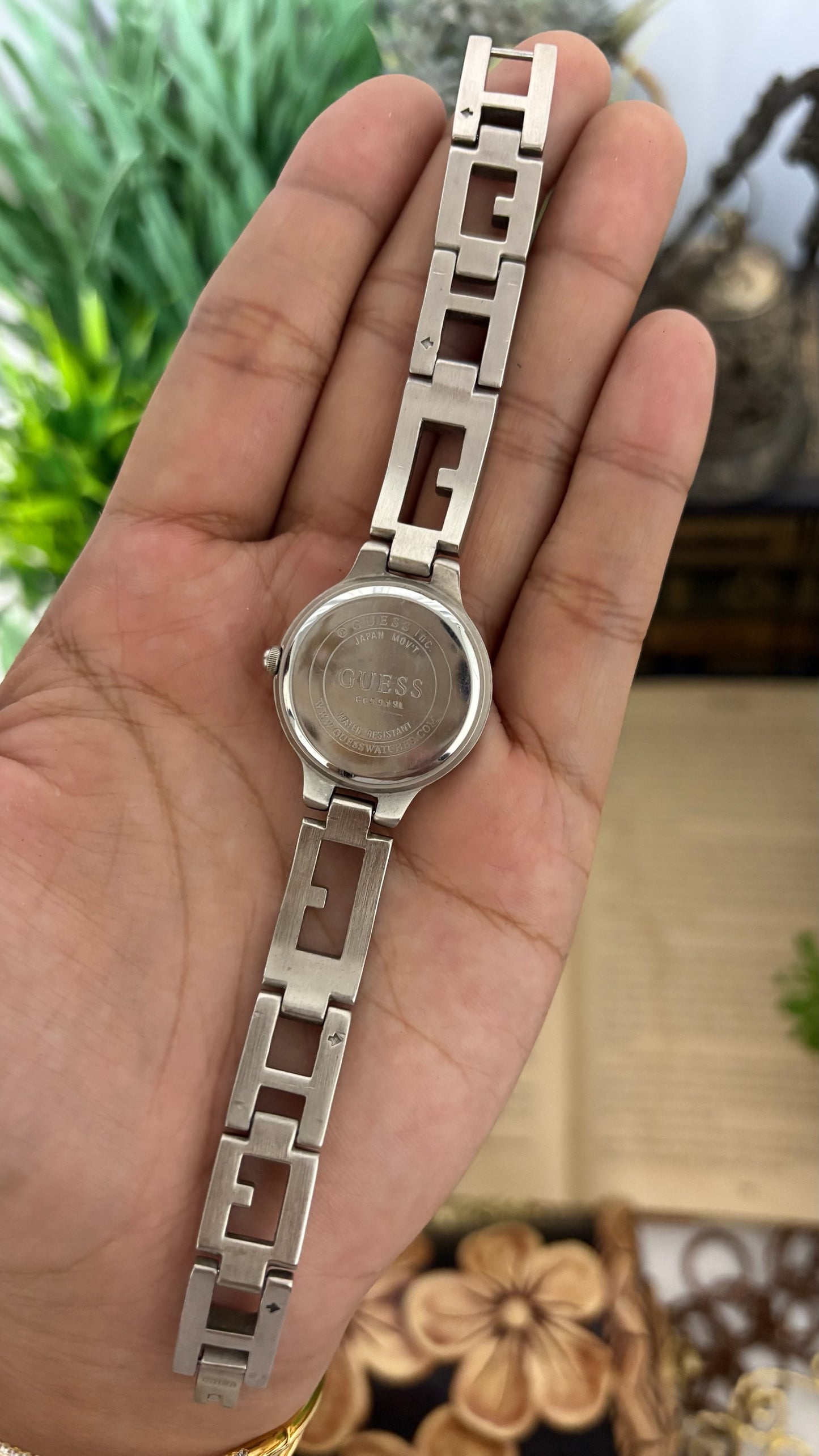 Vintage Guess Round Dress Watch with Thick Crystal-Set Bezel, Crystal Hour Markers, and White Ceramic Panel Link Bracelet in Gold Tone White Dial Quartz