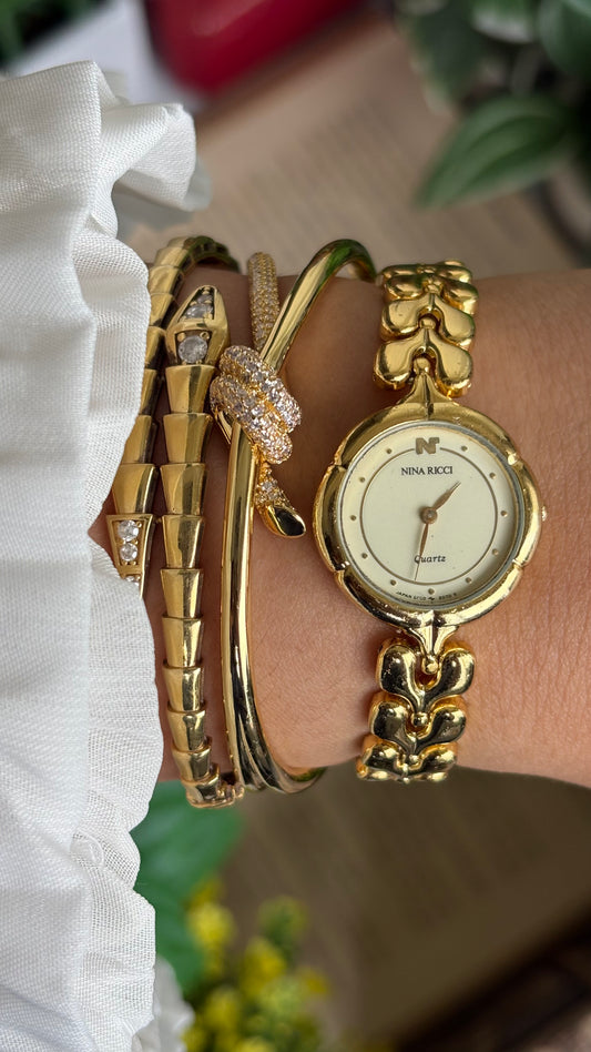 Vintage Nina Ricci Watch in Gold Tone Gold Dial