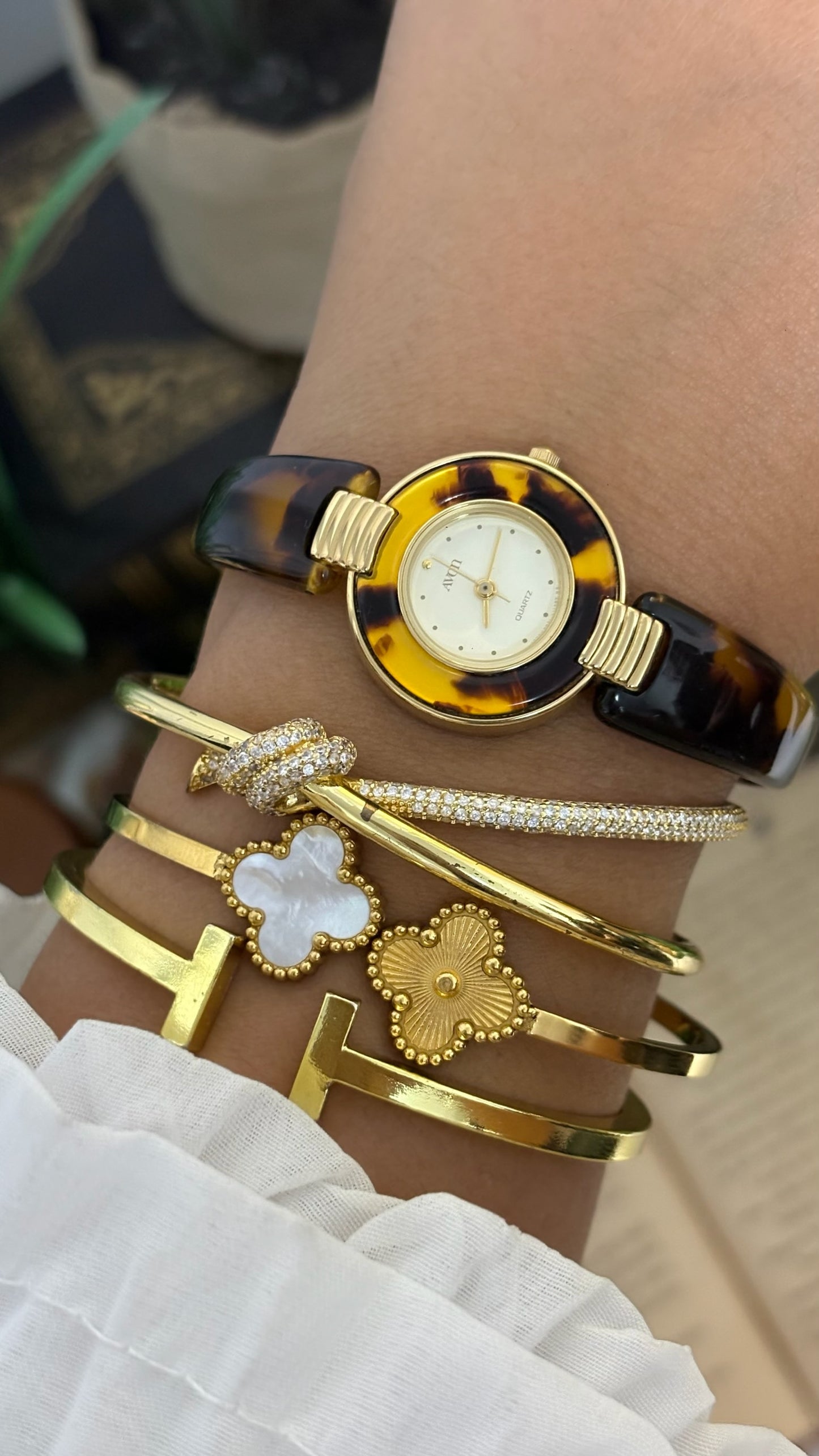 Vintage Avon Faux Tortoiseshell Bangle Watch in Gold Tone Quartz