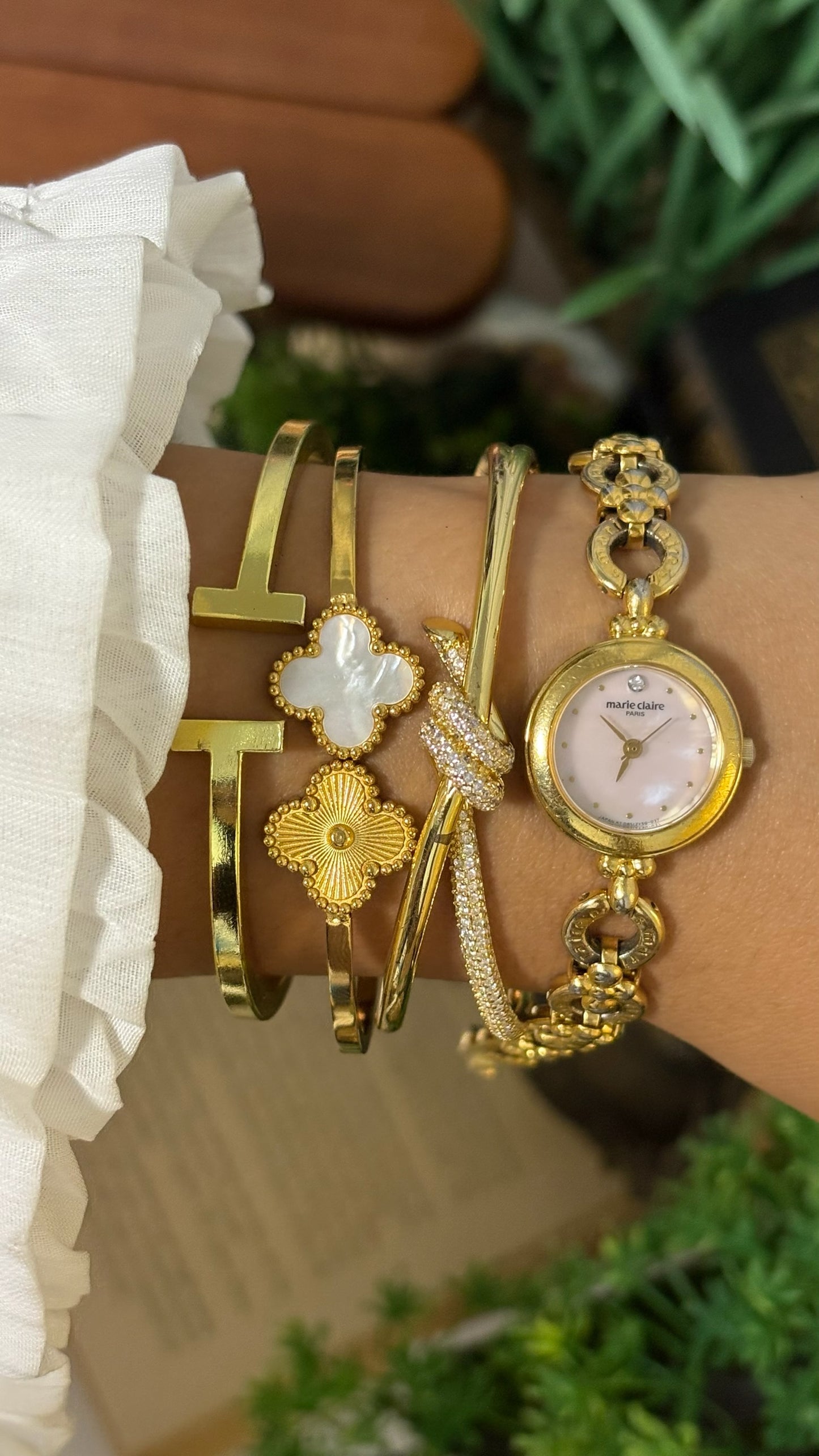 Vintage Marie Claire Round Mother of Pearl Dial Watch with Logo Ring Links in Gold Tone Quartz