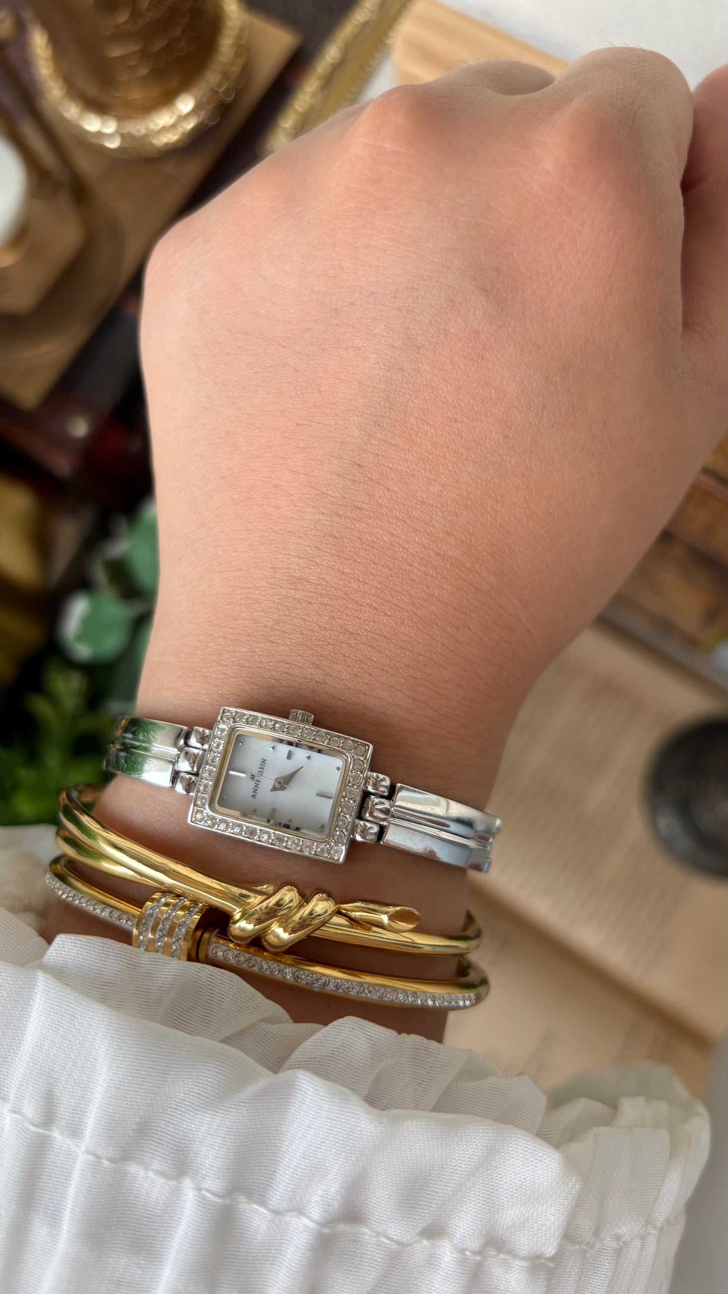 Rare Vintage Dainty Anne Klein Rhinestone Bezel Semi Bangle Watch in Silver Tone Mother of Pearl Dial Quartz