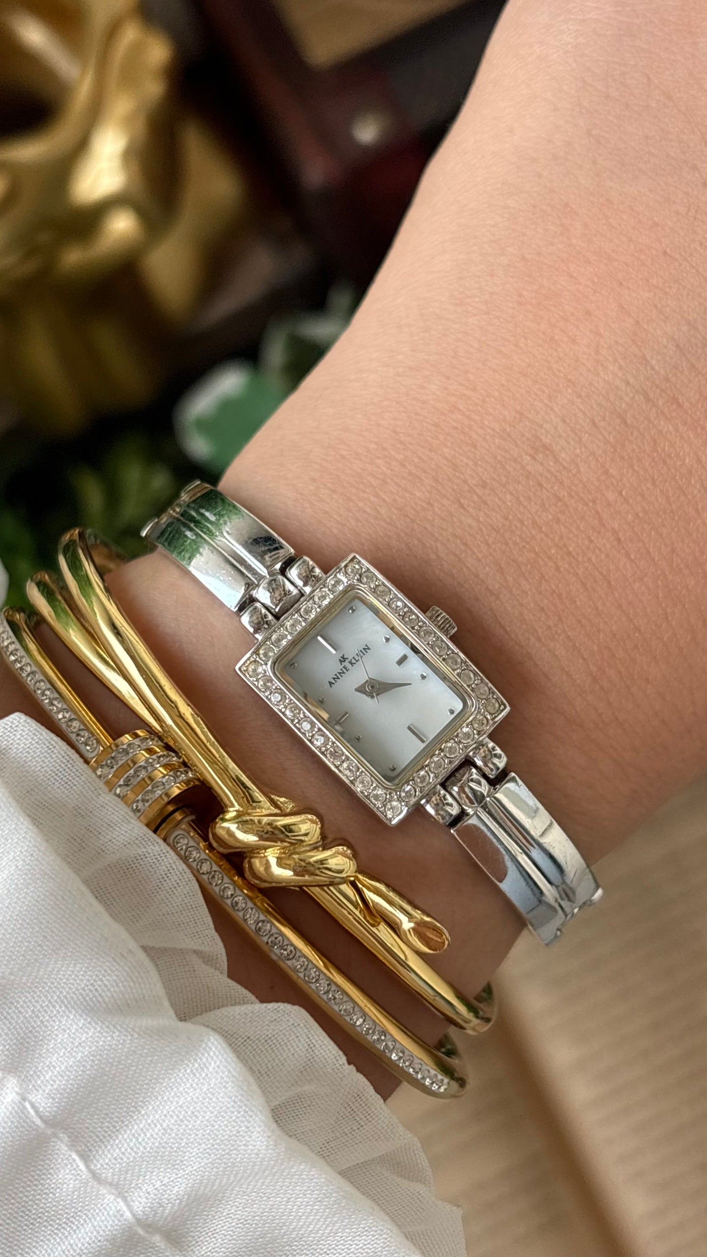 Rare Vintage Dainty Anne Klein Rhinestone Bezel Semi Bangle Watch in Silver Tone Mother of Pearl Dial Quartz