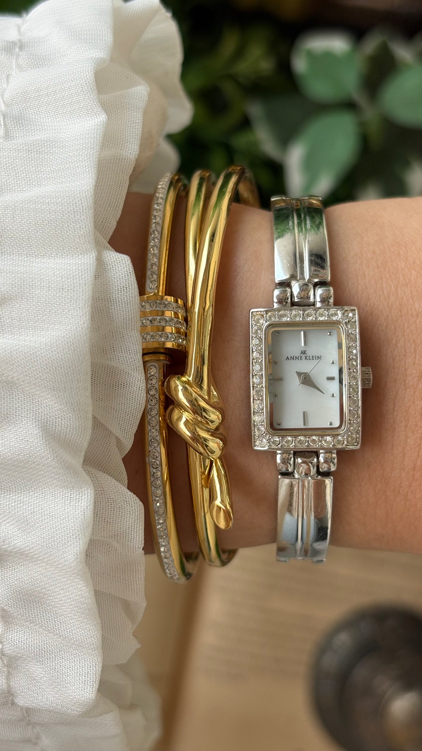 Rare Vintage Dainty Anne Klein Rhinestone Bezel Semi Bangle Watch in Silver Tone Mother of Pearl Dial Quartz