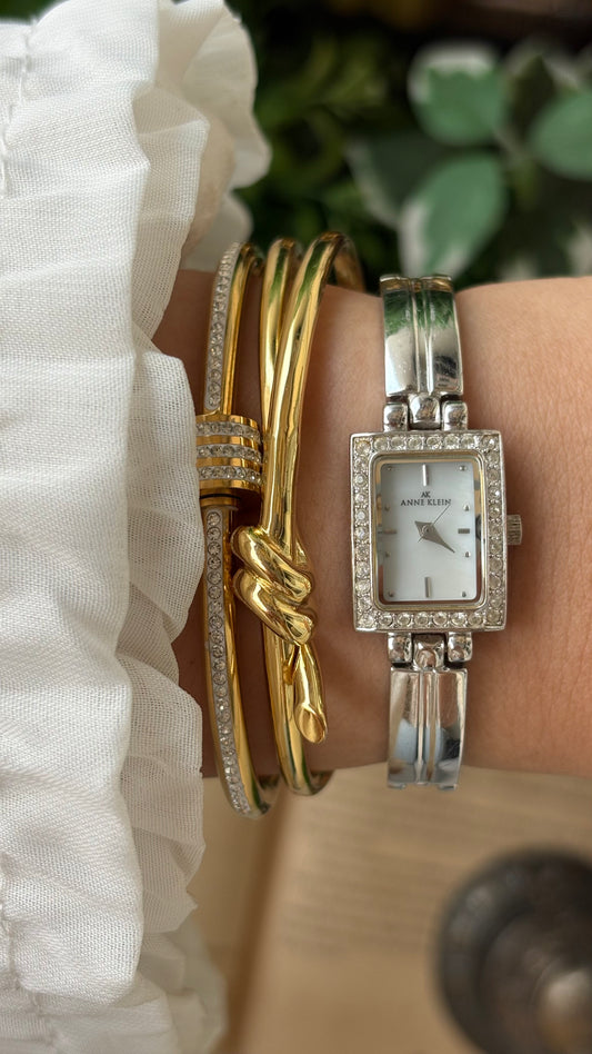 Rare Vintage Dainty Anne Klein Rhinestone Bezel Semi Bangle Watch in Silver Tone Mother of Pearl Dial Quartz