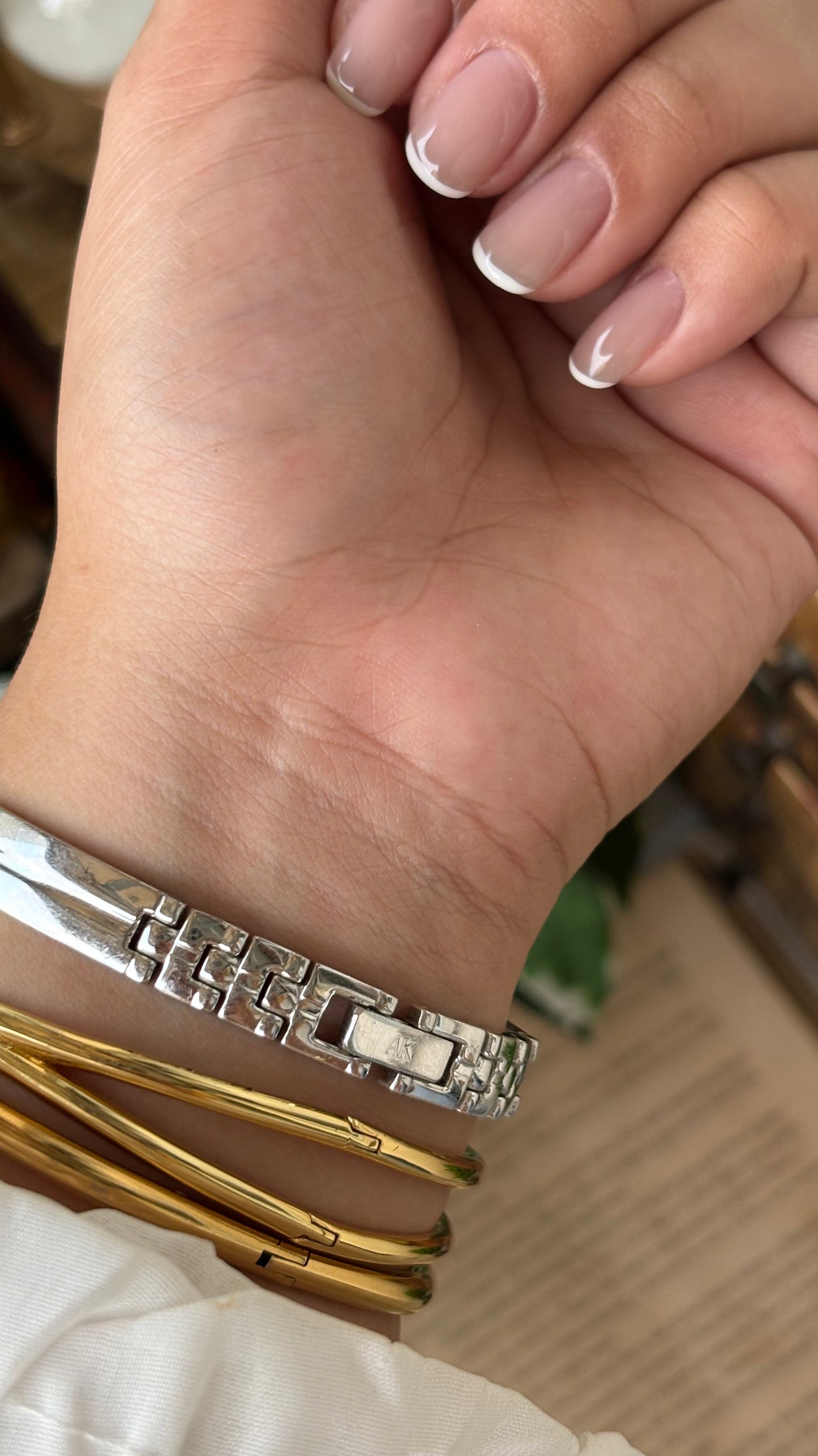 Rare Vintage Dainty Anne Klein Rhinestone Bezel Semi Bangle Watch in Silver Tone Mother of Pearl Dial Quartz