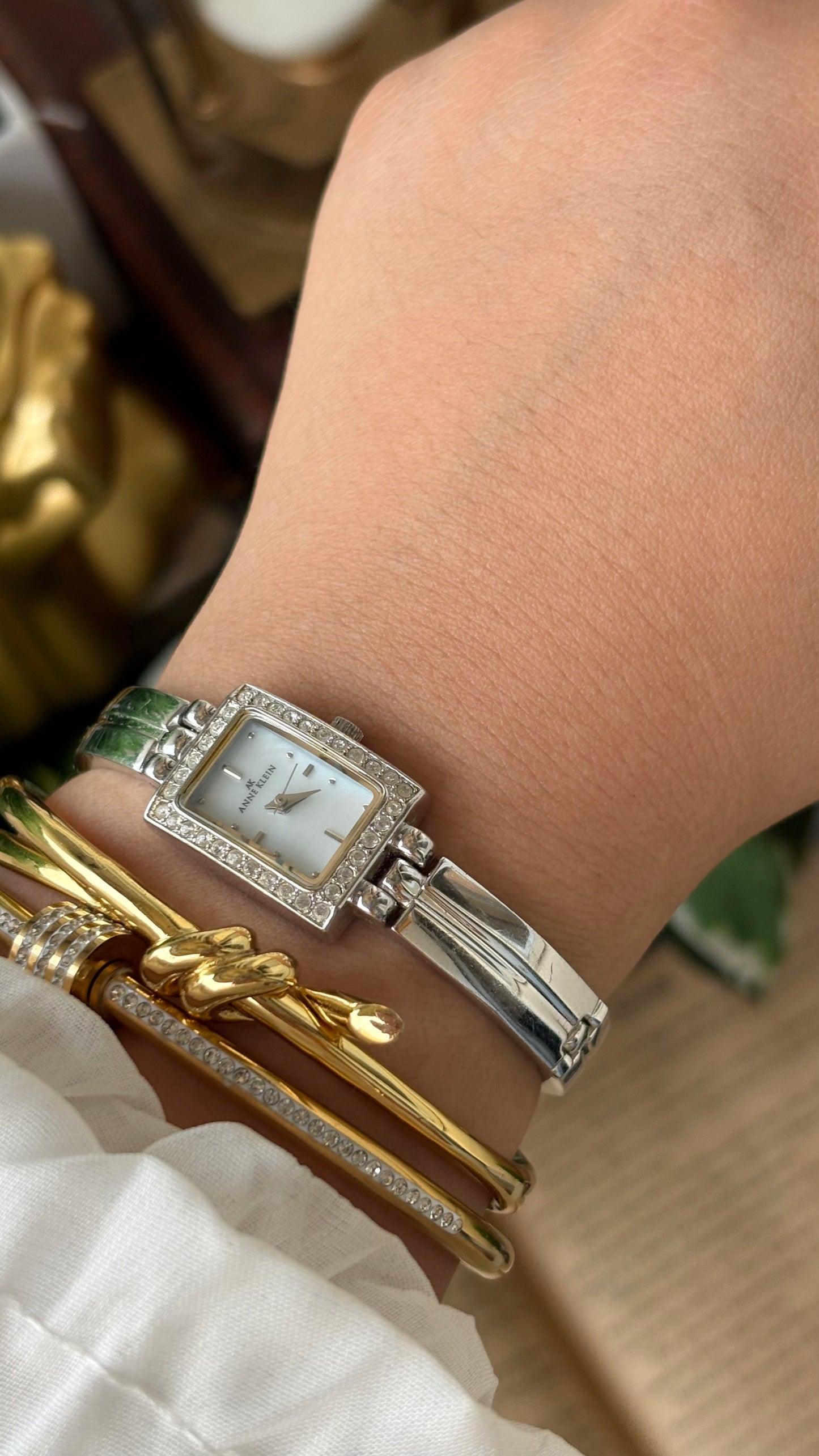 Rare Vintage Dainty Anne Klein Rhinestone Bezel Semi Bangle Watch in Silver Tone Mother of Pearl Dial Quartz