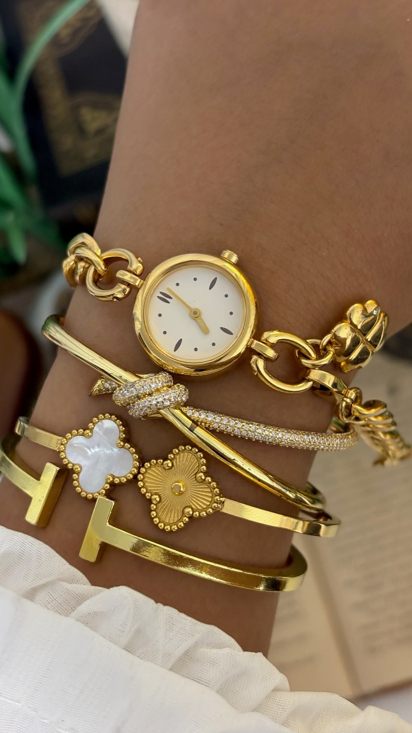 Vintage Noevir Round Minimalist Watch with Curb Chain and Clover Charm Bracelet in Gold Tone Quartz