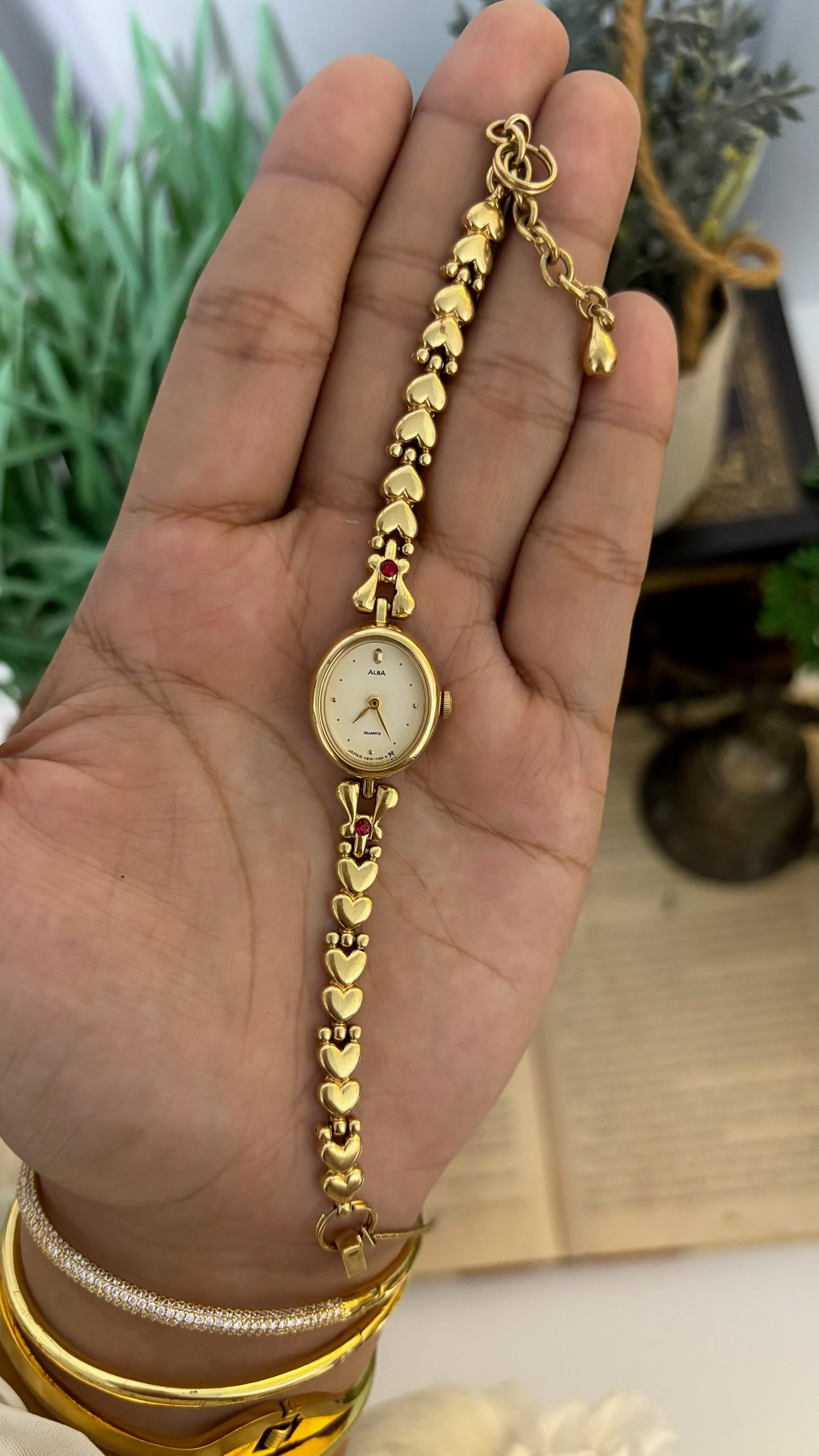 Vintage Alba Oval Dress Watch with Heart Link Chain and Red Stone Accents in Gold Tone Quartz